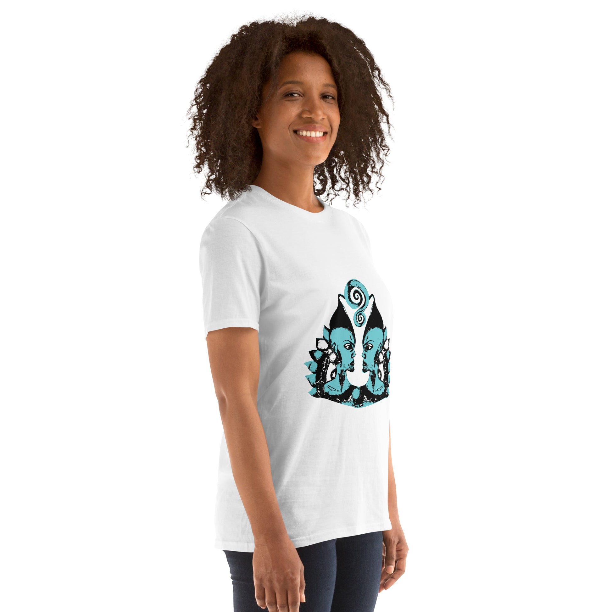 A model wearing white K.L.O.E. t-shirt showcasing a hand-drawn design of two mirrored faces in black and teal, embodying culturally inspired, bohemian style fashion focused on individuality and artistic expression.