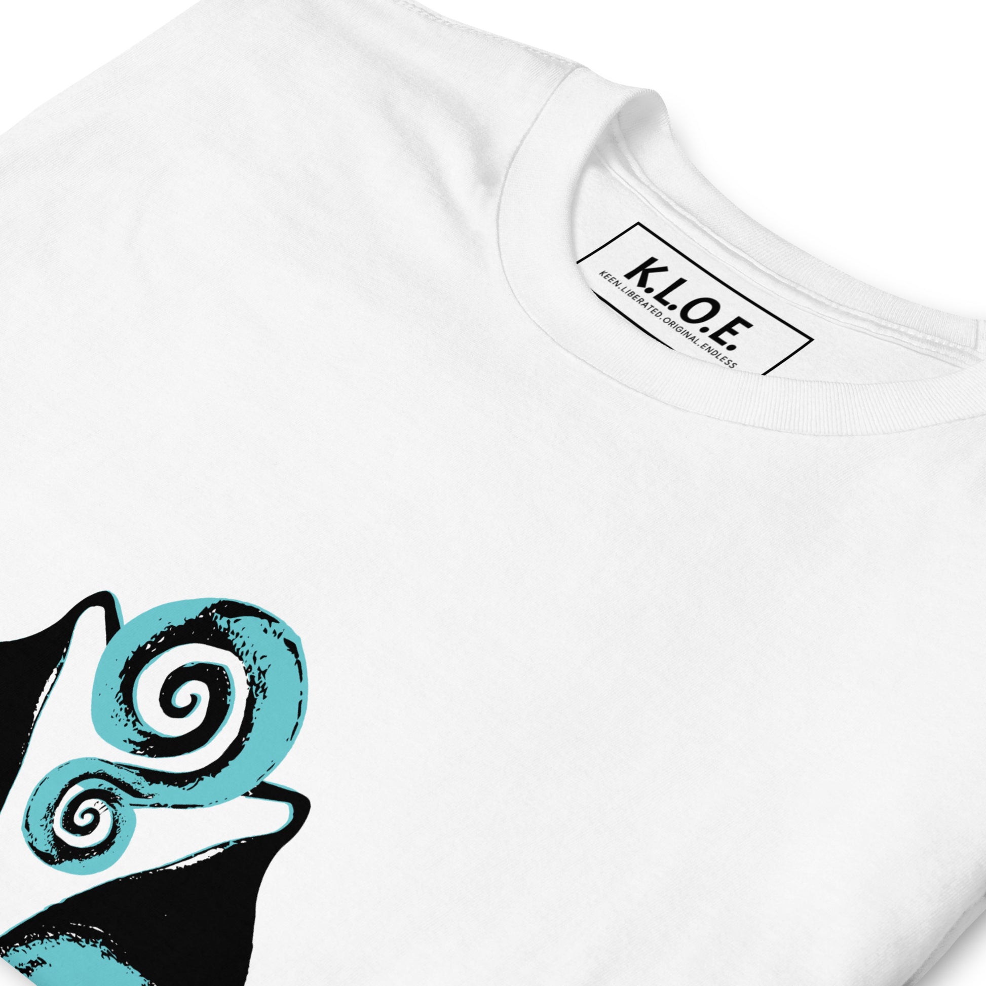 White K.L.O.E. t-shirt showcasing a hand-drawn design of two mirrored faces in black and teal, embodying culturally inspired, bohemian style fashion focused on individuality and artistic expression, detailed view showing the inside label.