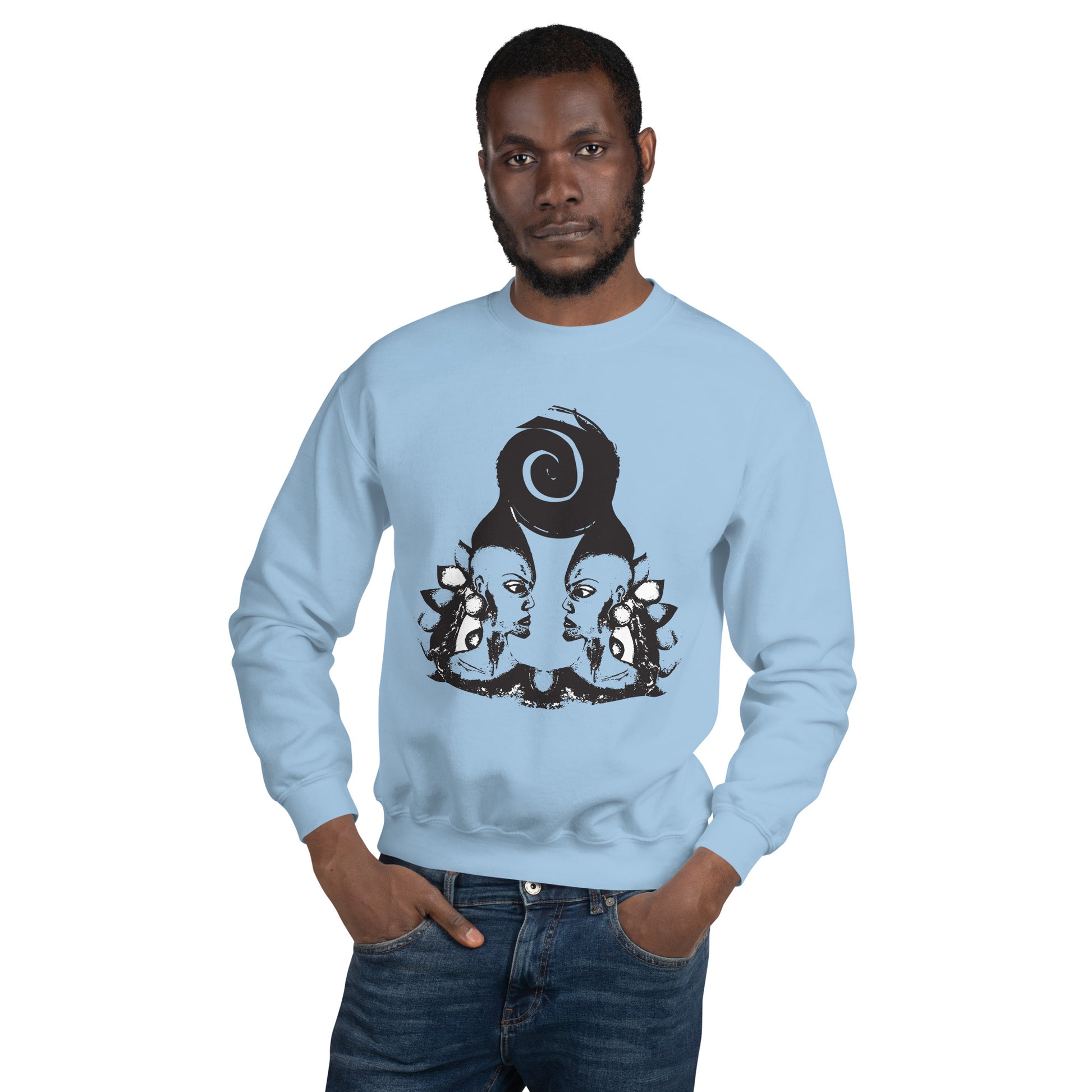 A male model wearing blue K.L.O.E. sweatshirt featuring a culturally inspired, hand-drawn design of two mirrored faces in bold black, showcasing unique artistry and self-expression in modern bohemian style clothing.
