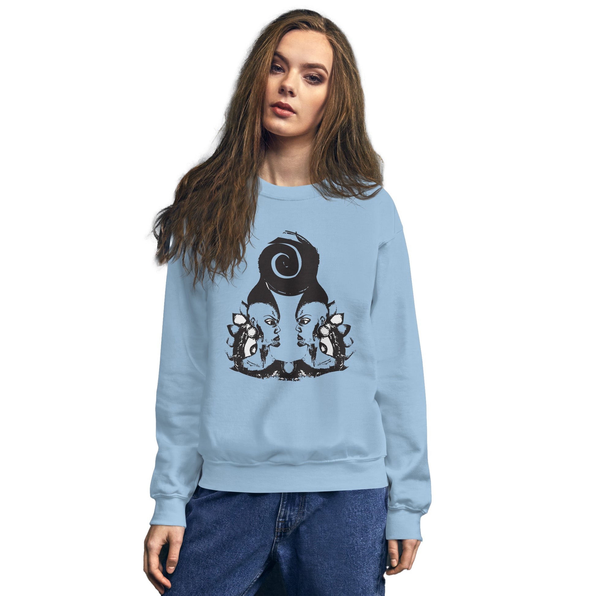 Model wearing blue K.L.O.E. sweatshirt featuring a culturally inspired, hand-drawn design of two mirrored faces in bold black, showcasing unique artistry and self-expression in modern bohemian style clothing.