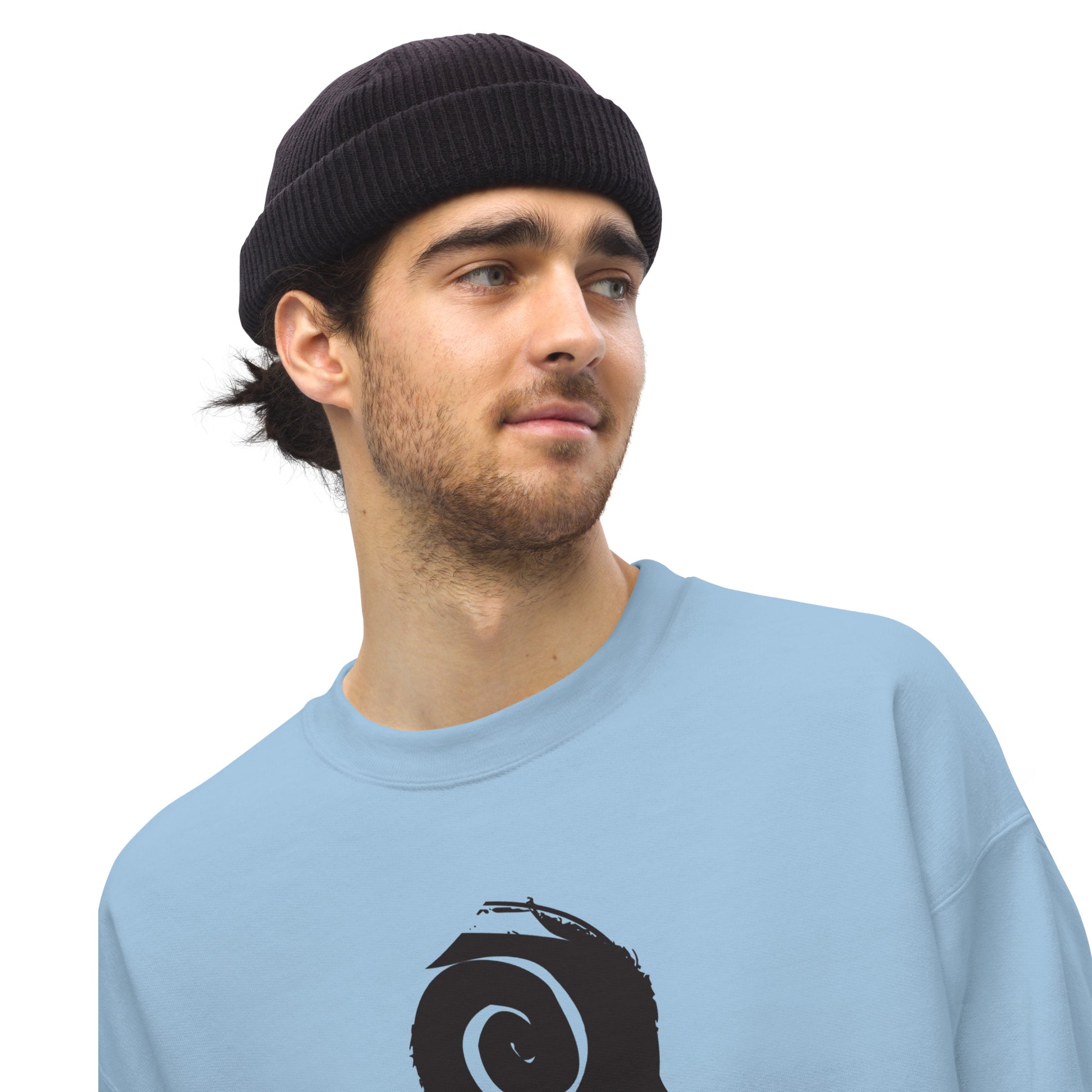 A male model wearing blue K.L.O.E. sweatshirt featuring a culturally inspired, hand-drawn design of two mirrored faces in bold black, showcasing unique artistry and self-expression in modern bohemian style clothing.