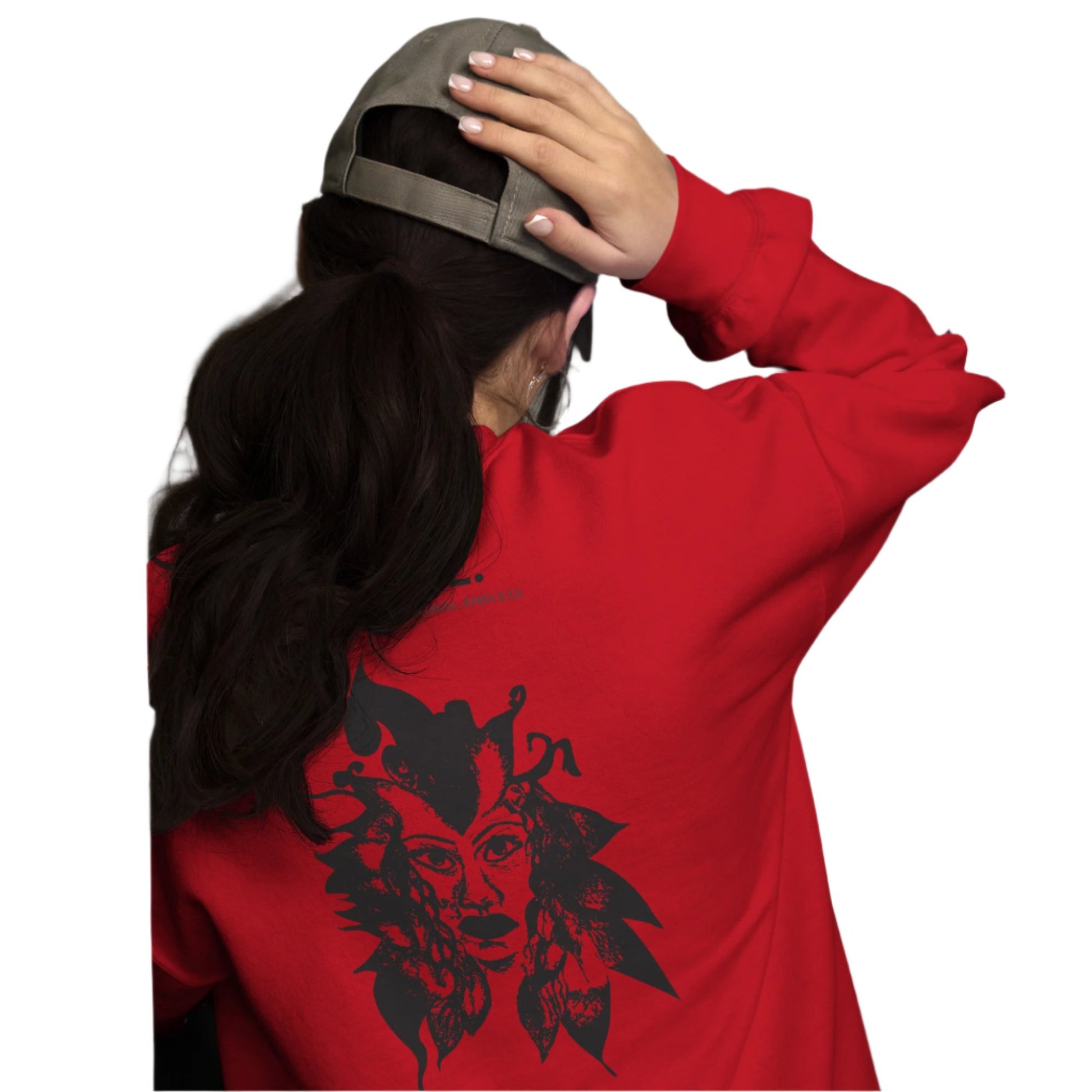 Back view of a red K.L.O.E. sweatshirt showcasing a culturally inspired, hand-drawn black design featuring a bold, expressive face intertwined with flowing, abstract patterns, and K.L.O.E. logo, embodying artistic self-expression and modern bohemian style fashion, on a model.