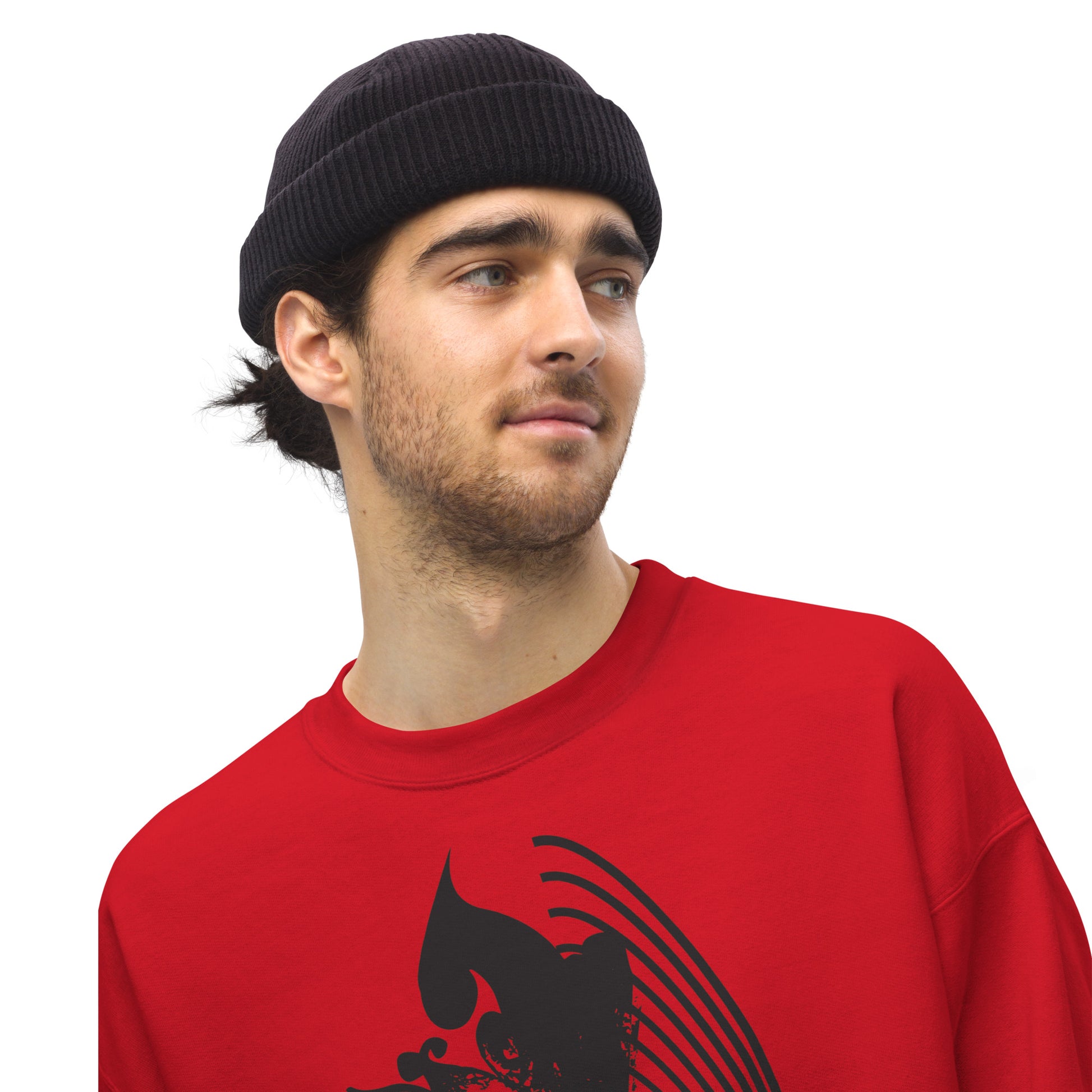 A model wearing red K.L.O.E. sweatshirt featuring a culturally inspired, hand-drawn black graphic of a bold, expressive face surrounded by intricate details, celebrating individuality and artistic self-expression in modern bohemian style fashion.