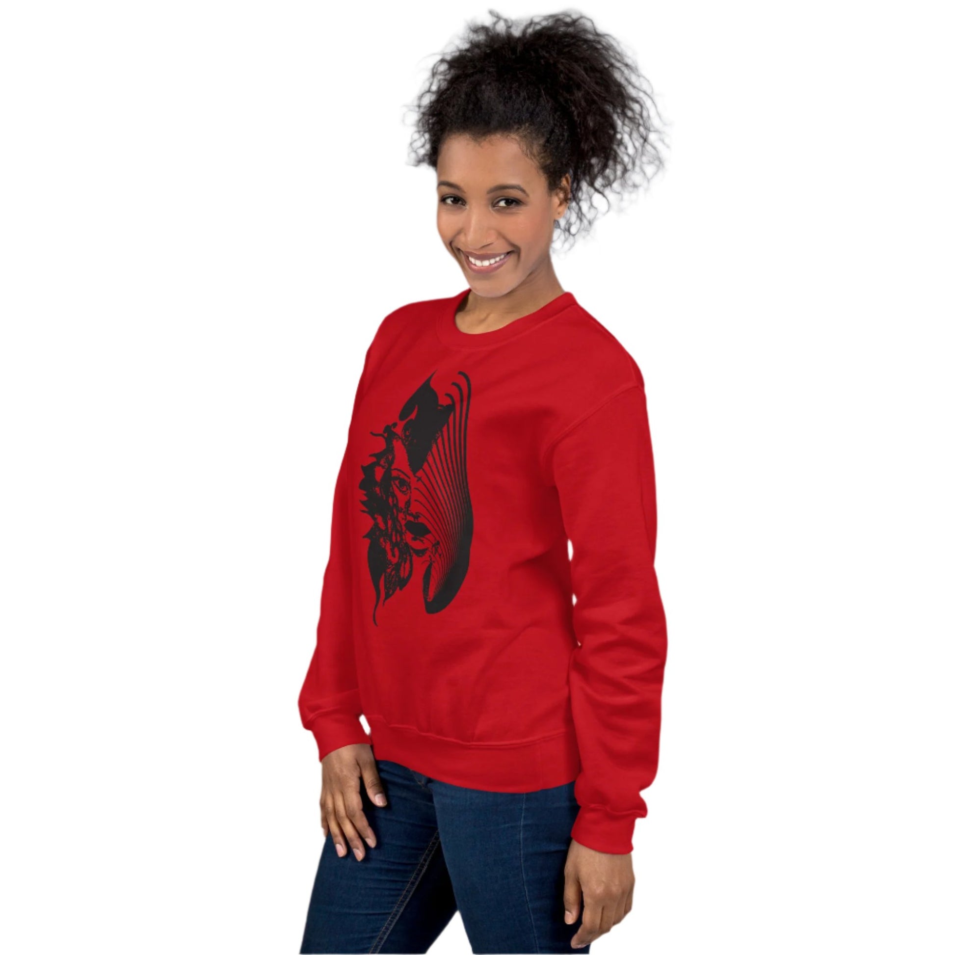 A model wearing red K.L.O.E. sweatshirt featuring a culturally inspired, hand-drawn black graphic of a bold, expressive face surrounded by intricate details, celebrating individuality and artistic self-expression in modern bohemian style fashion.
