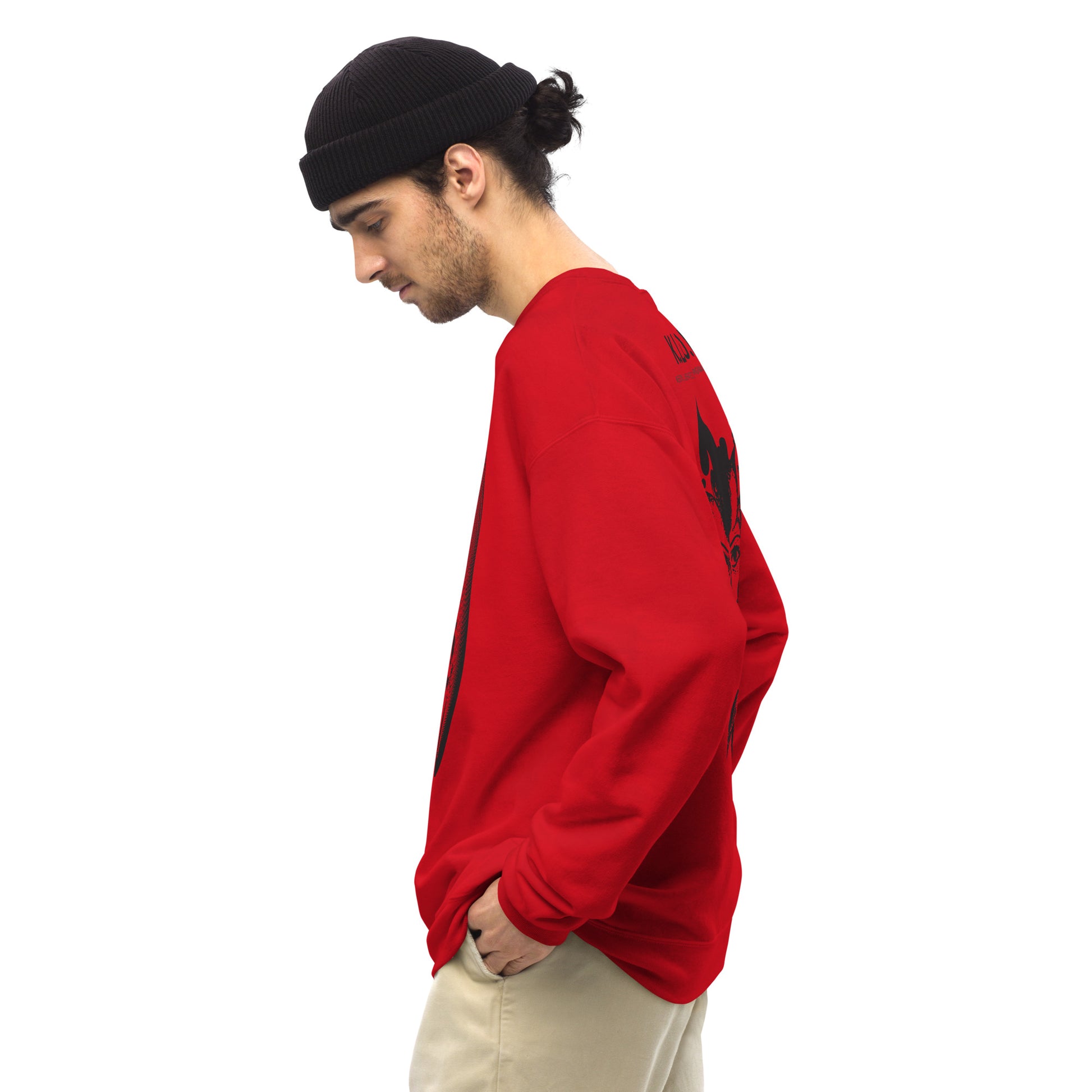 A model wearing red K.L.O.E. sweatshirt featuring a culturally inspired, hand-drawn black graphic of a bold, expressive face surrounded by intricate details, celebrating individuality and artistic self-expression in modern bohemian style fashion.
