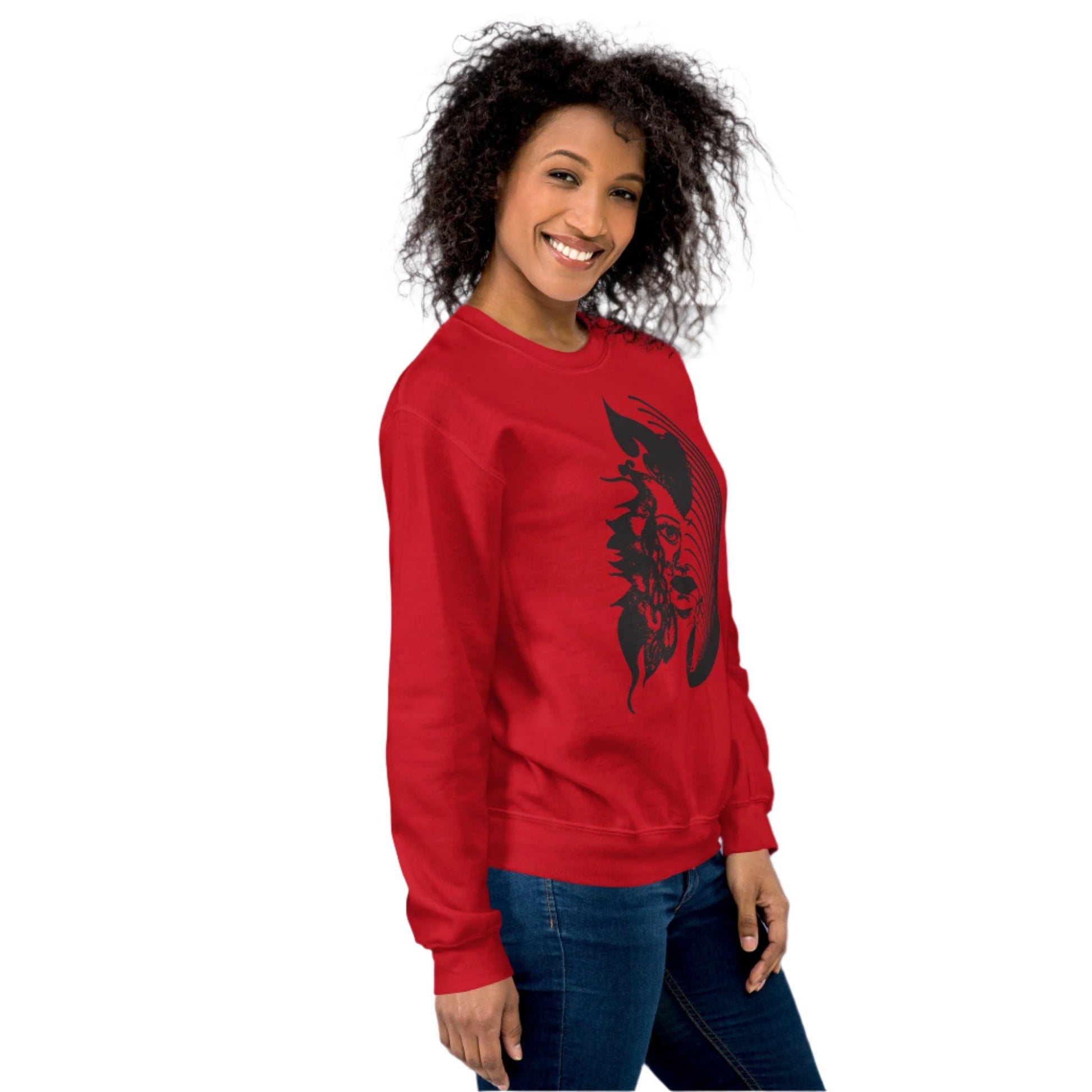 A model wearing red K.L.O.E. sweatshirt featuring a culturally inspired, hand-drawn black graphic of a bold, expressive face surrounded by intricate details, celebrating individuality and artistic self-expression in modern bohemian style fashion.