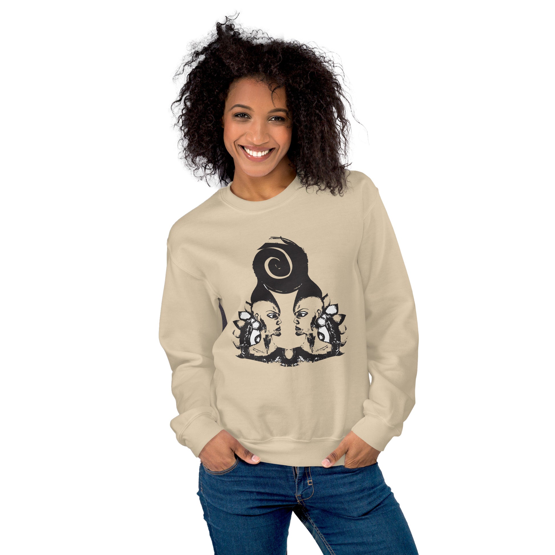 A model wearing sand color K.L.O.E. sweatshirt featuring a culturally inspired, hand-drawn design of two mirrored faces in bold black, showcasing unique artistry and self-expression in modern bohemian style clothing.