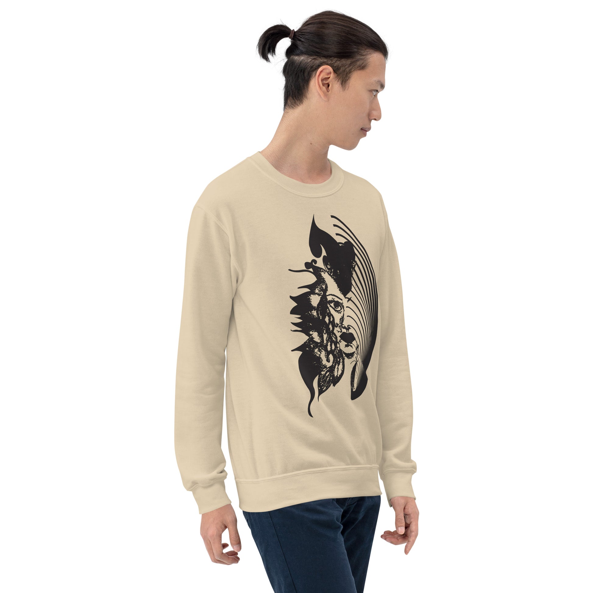  A model wearing sand K.L.O.E. sweatshirt featuring a culturally inspired, hand-drawn black graphic of a bold, expressive face surrounded by intricate details, celebrating individuality and artistic self-expression in modern bohemian style fashion.