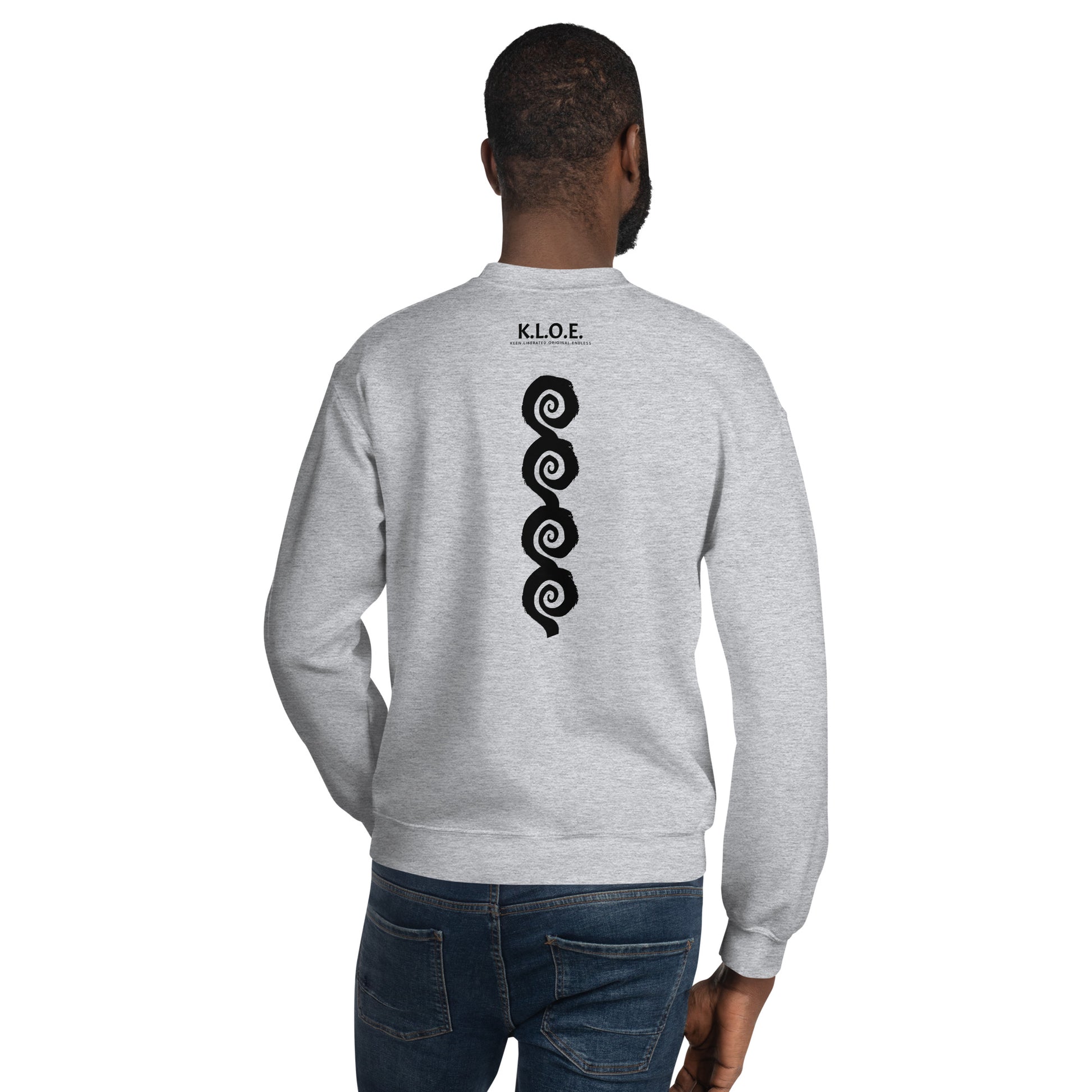 Back view of grey K.L.O.E. sweatshirt showcasing a bold, hand-drawn black spiral design symbolising creativity and individuality, with the K.L.O.E. logo above, reflecting modern bohemian style and artistic self-expression, worn by a male model.
