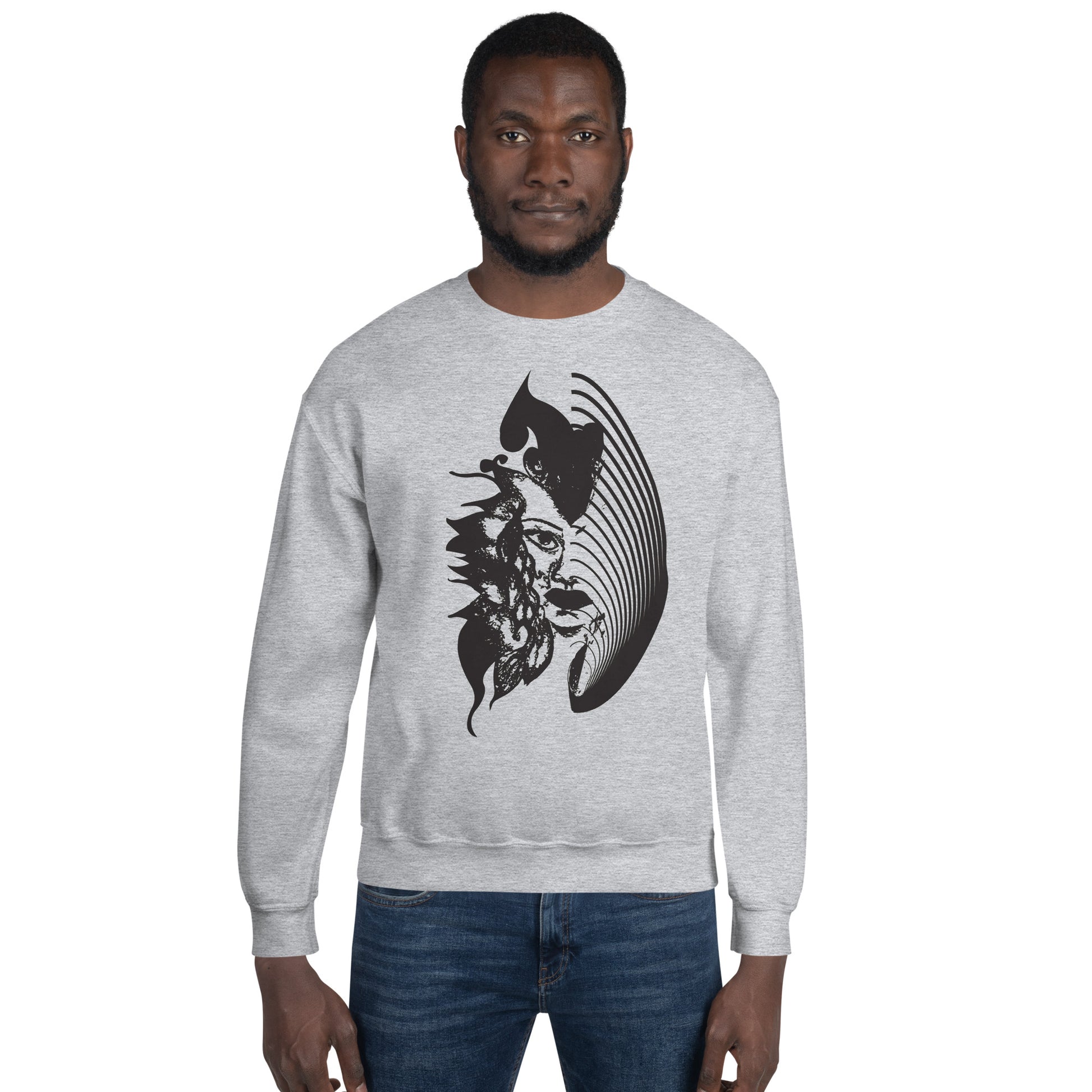 A model wearing grey K.L.O.E. sweatshirt featuring a culturally inspired, hand-drawn black graphic of a bold, expressive face surrounded by intricate details, celebrating individuality and artistic self-expression in modern bohemian style fashion.