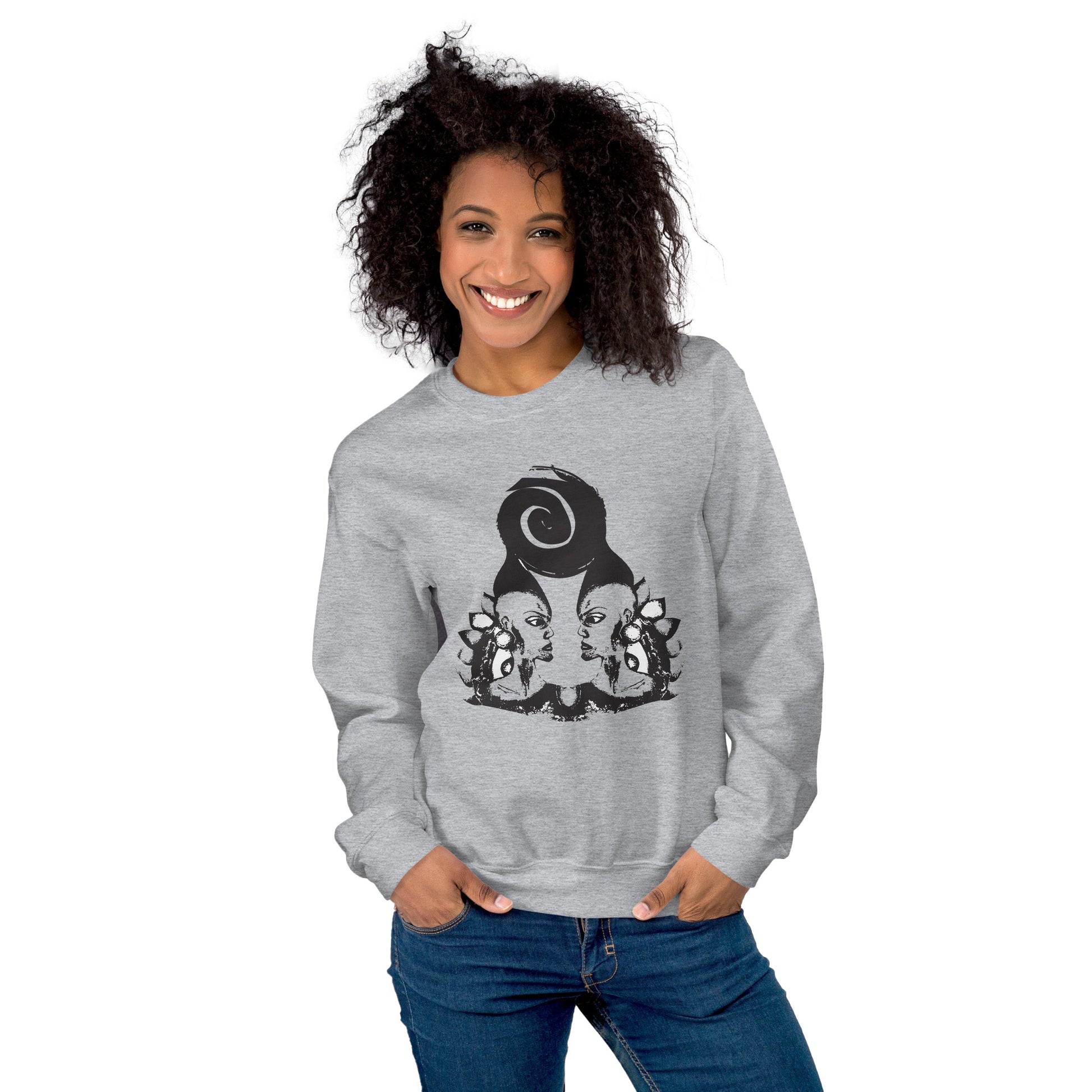 A model wearing grey K.L.O.E. sweatshirt featuring a culturally inspired, hand-drawn design of two mirrored faces in bold black, showcasing unique artistry and self-expression in modern bohemian style clothing.