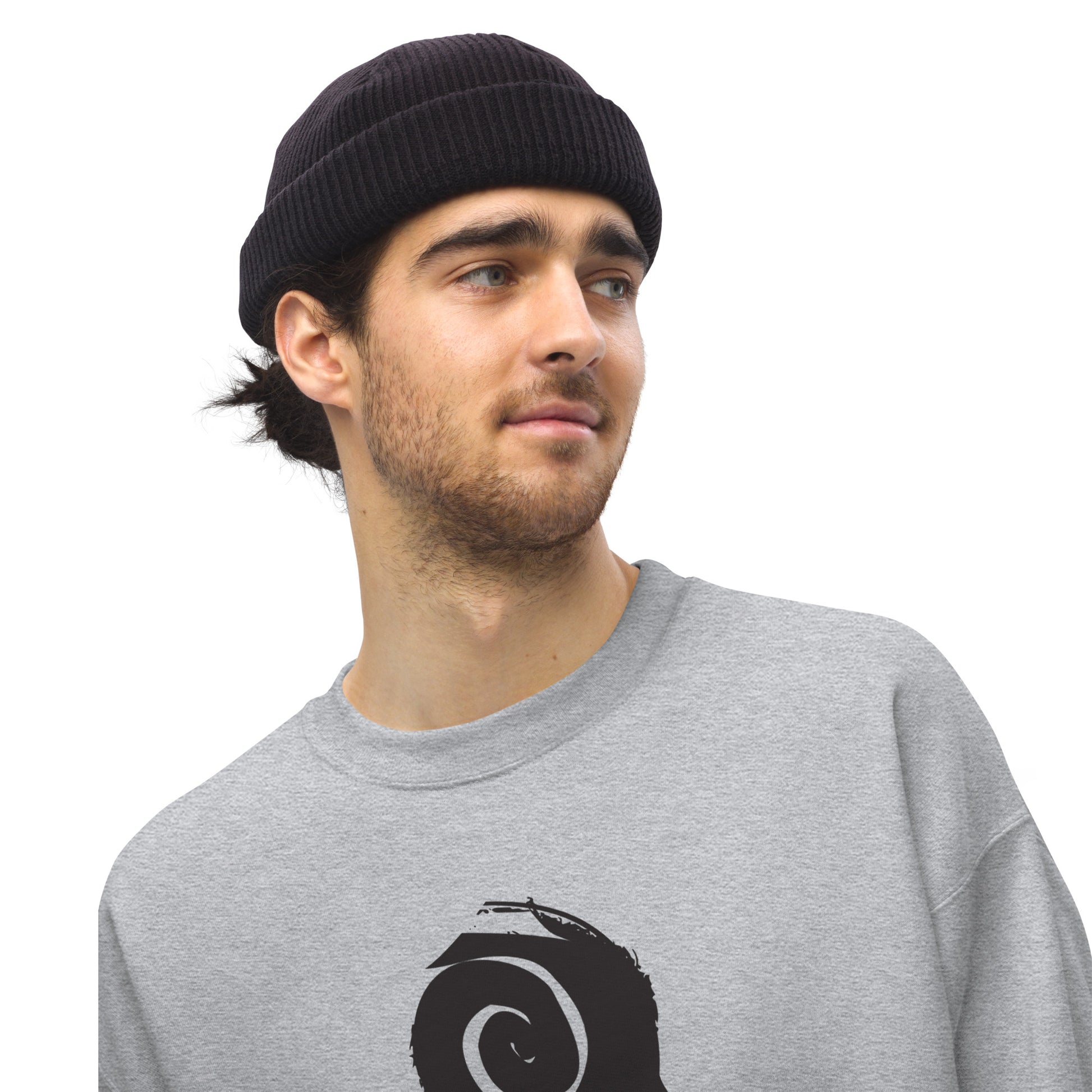 A male model wearing grey K.L.O.E. sweatshirt featuring a culturally inspired, hand-drawn design of two mirrored faces in bold black, showcasing unique artistry and self-expression in modern bohemian style clothing.