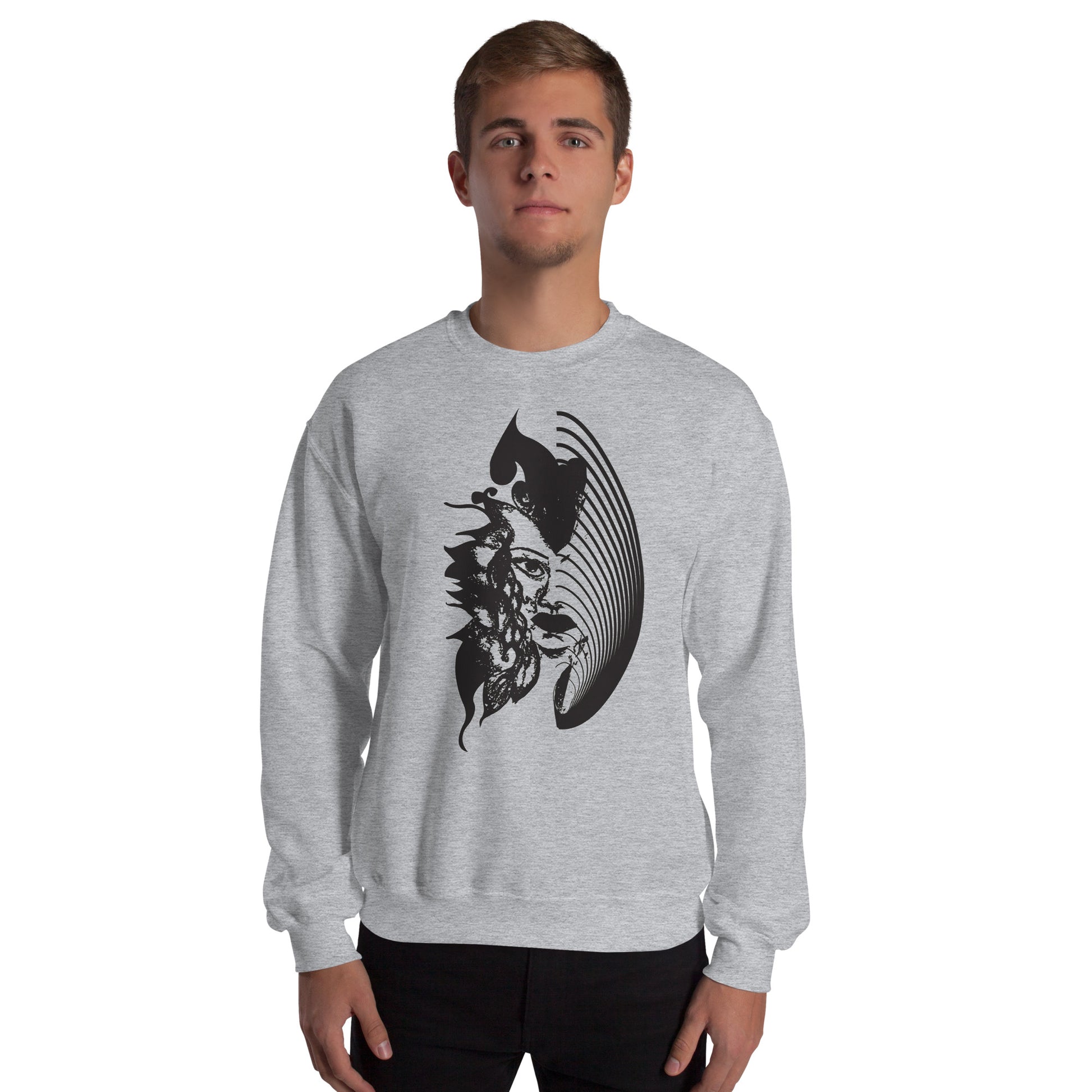 A model wearing grey K.L.O.E. sweatshirt featuring a culturally inspired, hand-drawn black graphic of a bold, expressive face surrounded by intricate details, celebrating individuality and artistic self-expression in modern bohemian style fashion.