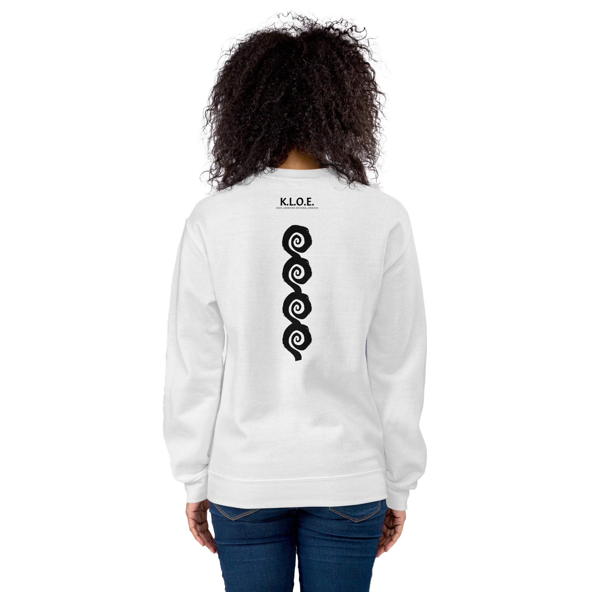 Back view of white K.L.O.E. sweatshirt showcasing a bold, hand-drawn black spiral design symbolising creativity and individuality, with the K.L.O.E. logo above, reflecting modern bohemian style and artistic self-expression, worn by a model.