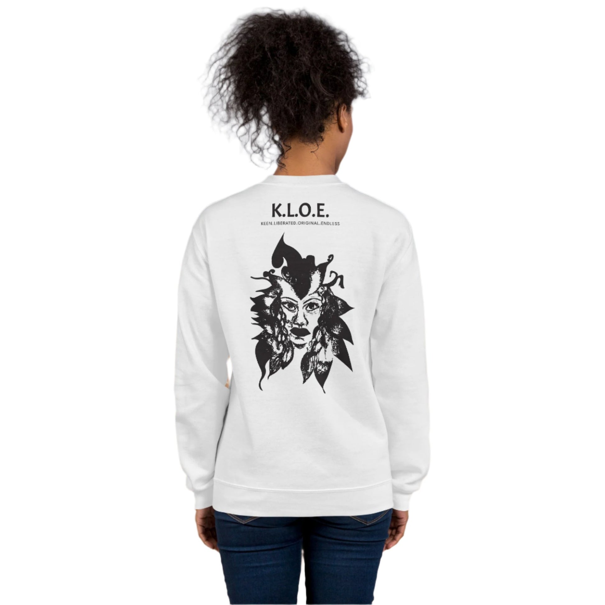 Back view of a white K.L.O.E. sweatshirt showcasing a culturally inspired, hand-drawn black design featuring a bold, expressive face intertwined with flowing, abstract patterns, and K.L.O.E. logo, embodying artistic self-expression and modern bohemian style fashion, on a model.