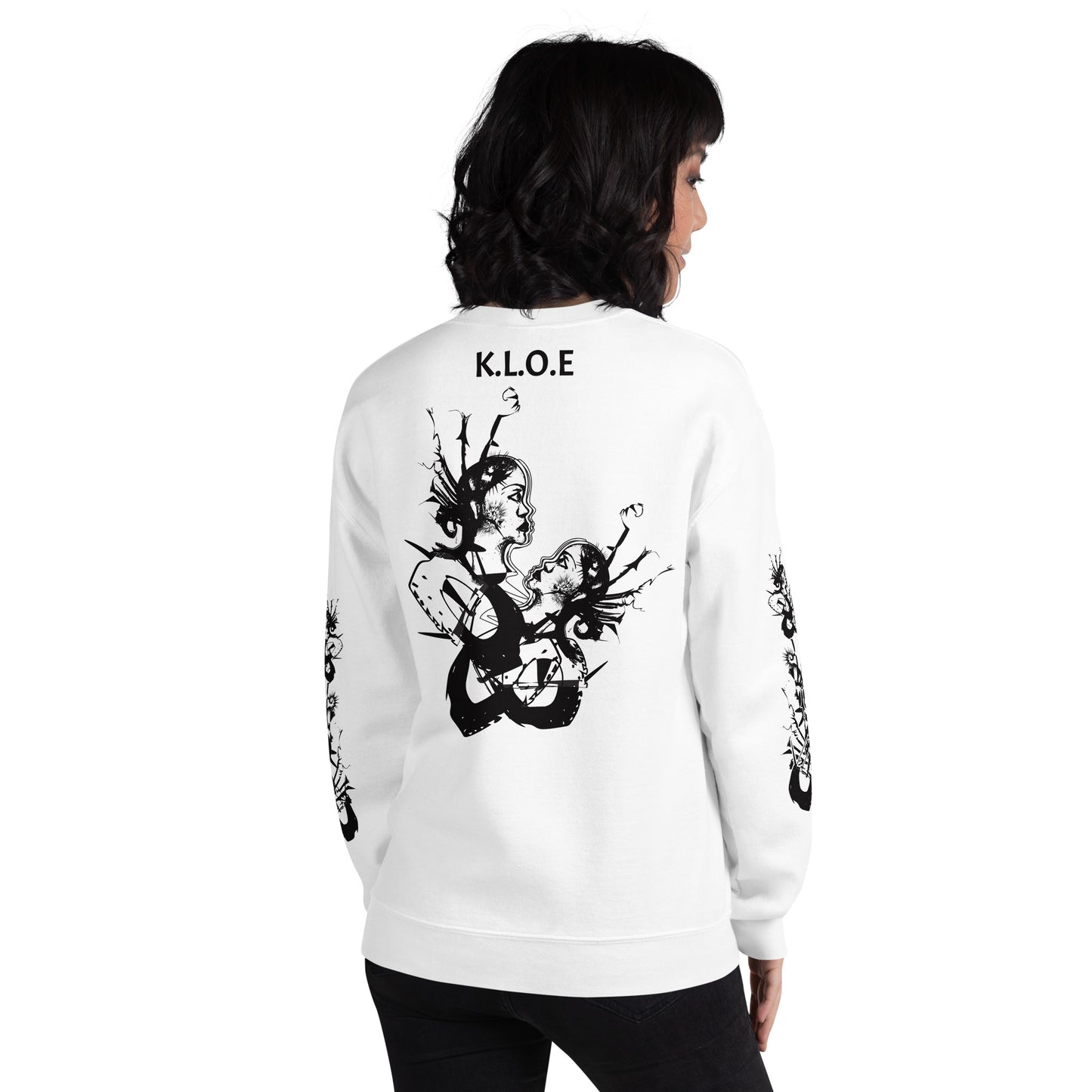 Back view of white unisex K.L.O.E. sweatshirt with black abstract hand-drawn illustration of two faces intertwined with organic shapes and cultural symbolism—expressing metamorphosis, identity, and artistic freedom.