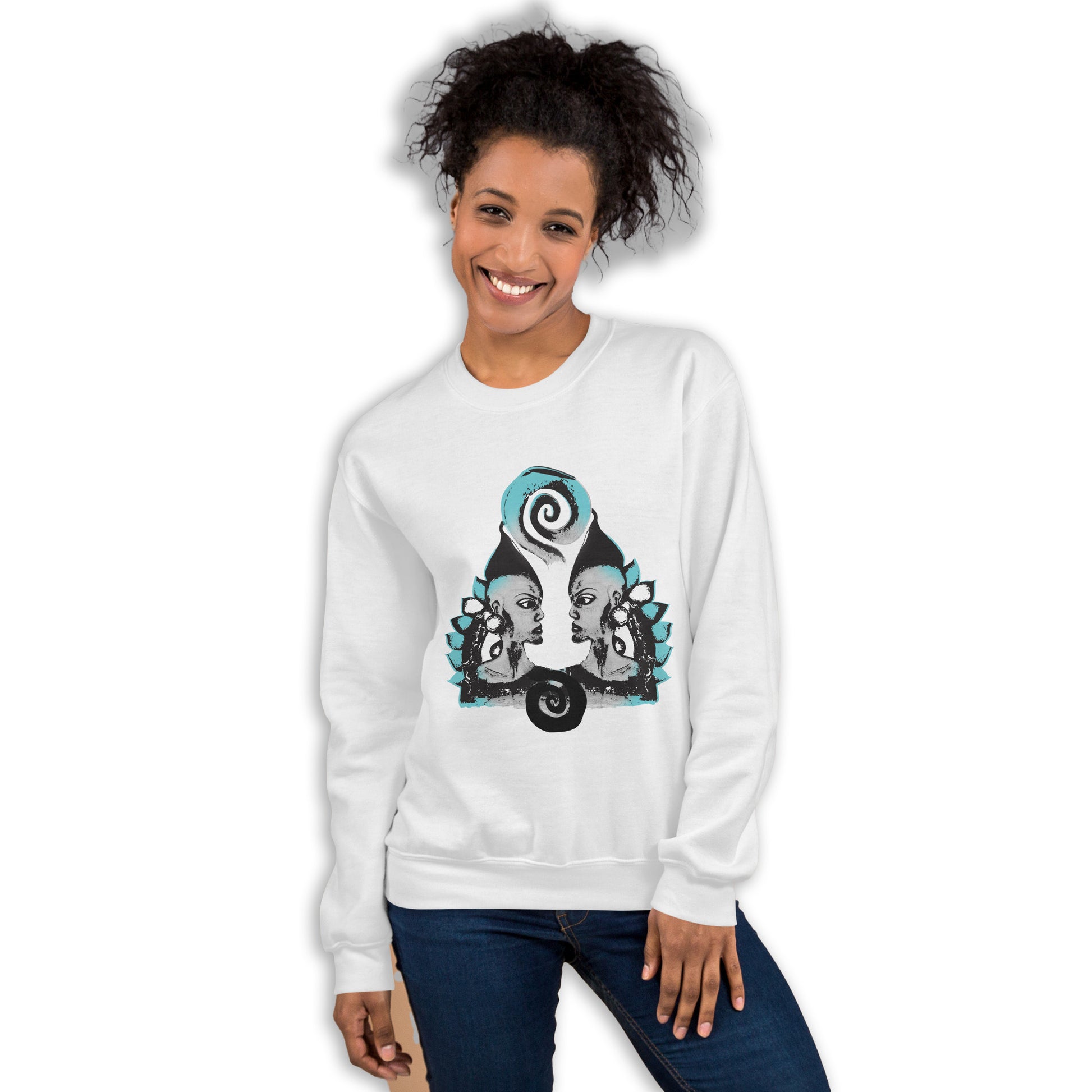 The model wearing white K.L.O.E. sweatshirt with a culturally inspired, hand-drawn design of two mirrored faces in bold black and teal, celebrating self-expression and individuality in modern bohemian style clothing.