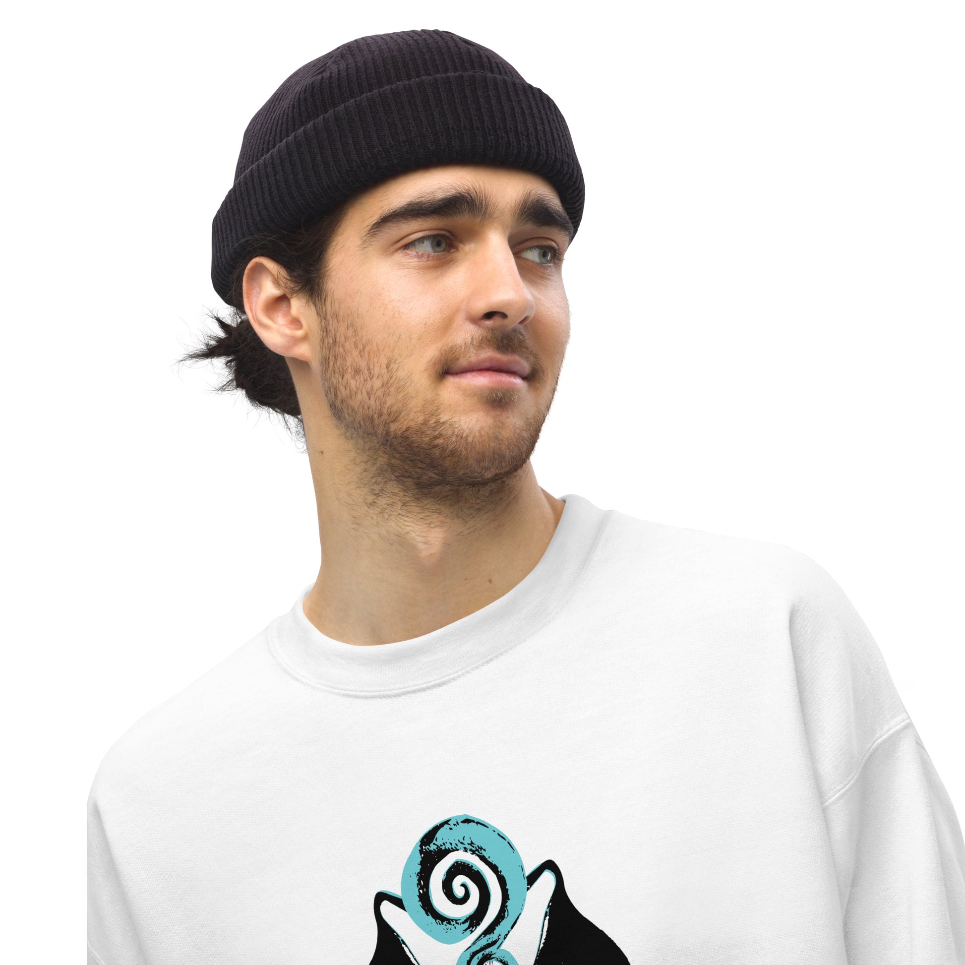 Close up look of a male model wearing the white K.L.O.E. sweatshirt featuring a hand-drawn design of two mirrored faces in bold black and teal, showcasing cultural inspiration, individuality, and modern bohemian style self-expression.