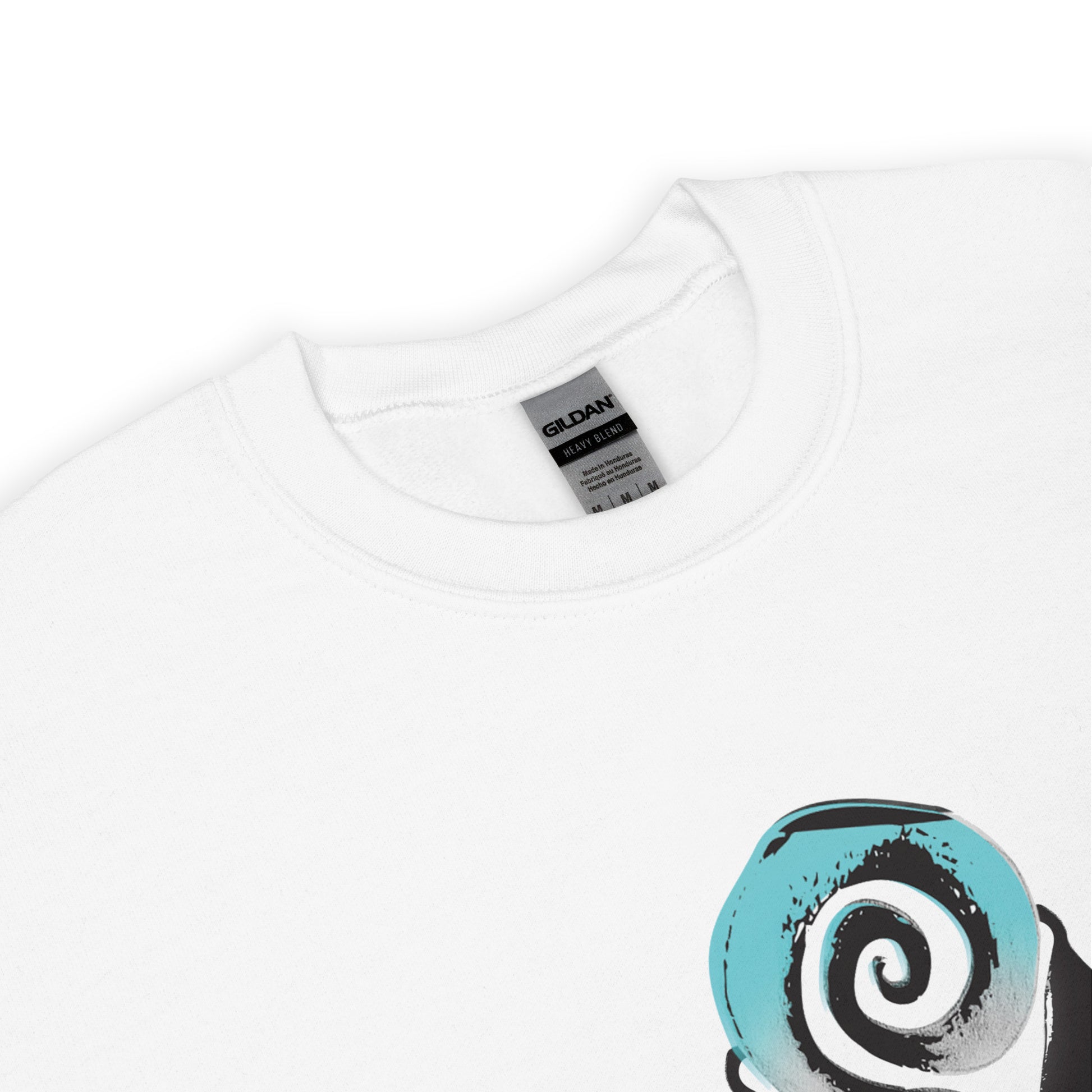 The detail view of the white K.L.O.E. sweatshirt with a culturally inspired, hand-drawn design of two mirrored faces in bold black and teal, celebrating self-expression and individuality in modern bohemian style clothing.