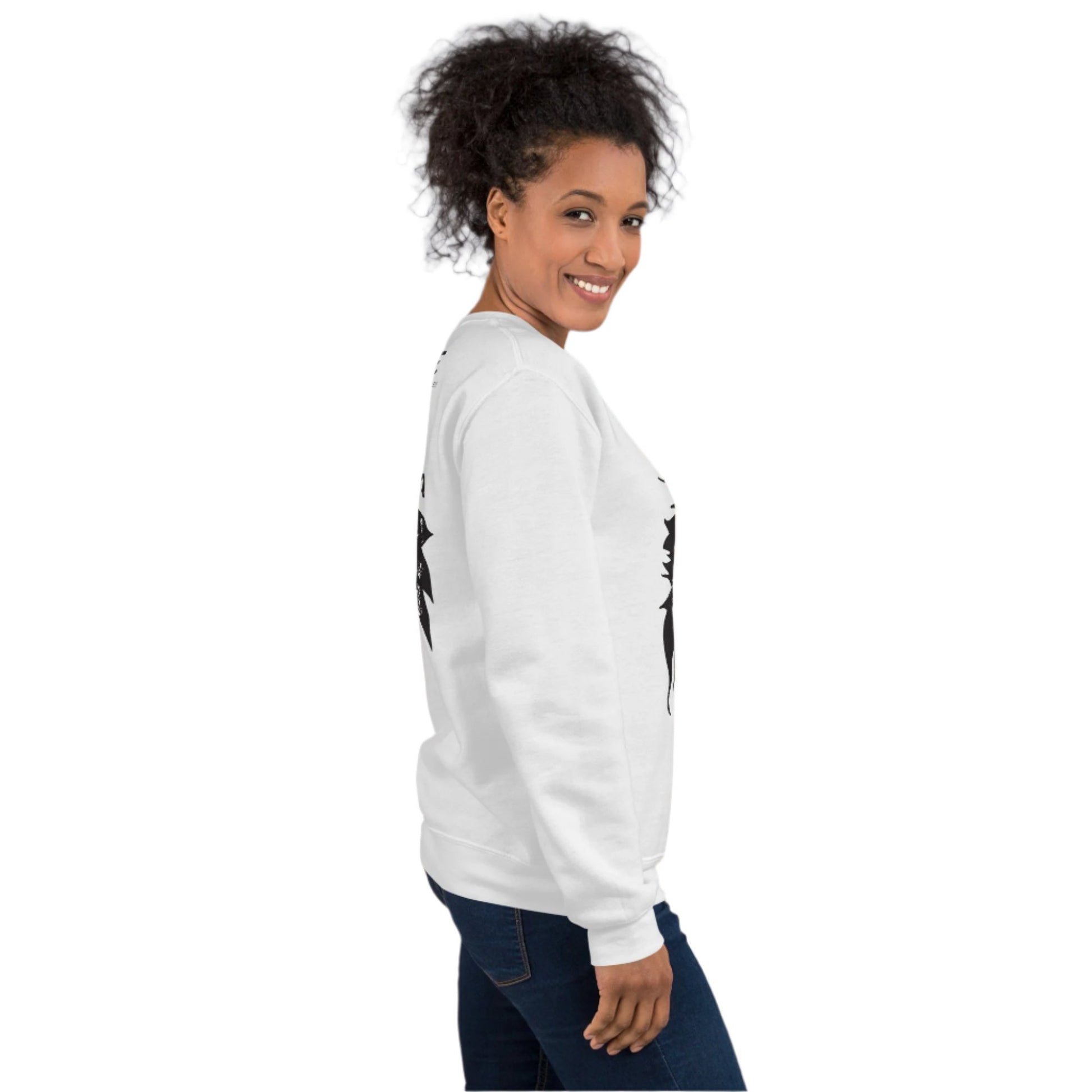 A model wearing white K.L.O.E. sweatshirt featuring a culturally inspired, hand-drawn black graphic of a bold, expressive face surrounded by intricate details, celebrating individuality and artistic self-expression in modern bohemian style fashion.Orange K.L.O.E. T-shirt featuring a culturally inspired, hand-drawn black graphic of a bold, expressive face surrounded by intricate details, celebrating individuality and artistic self-expression in modern bohemian style fashion, side view.
