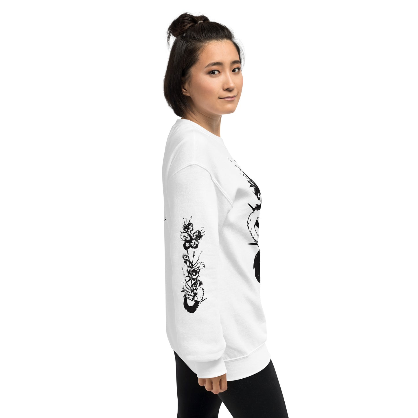 Side view of white unisex K.L.O.E. sweatshirt with black abstract hand-drawn illustration of two faces intertwined with organic shapes and cultural symbolism—expressing metamorphosis, identity, and artistic freedom.