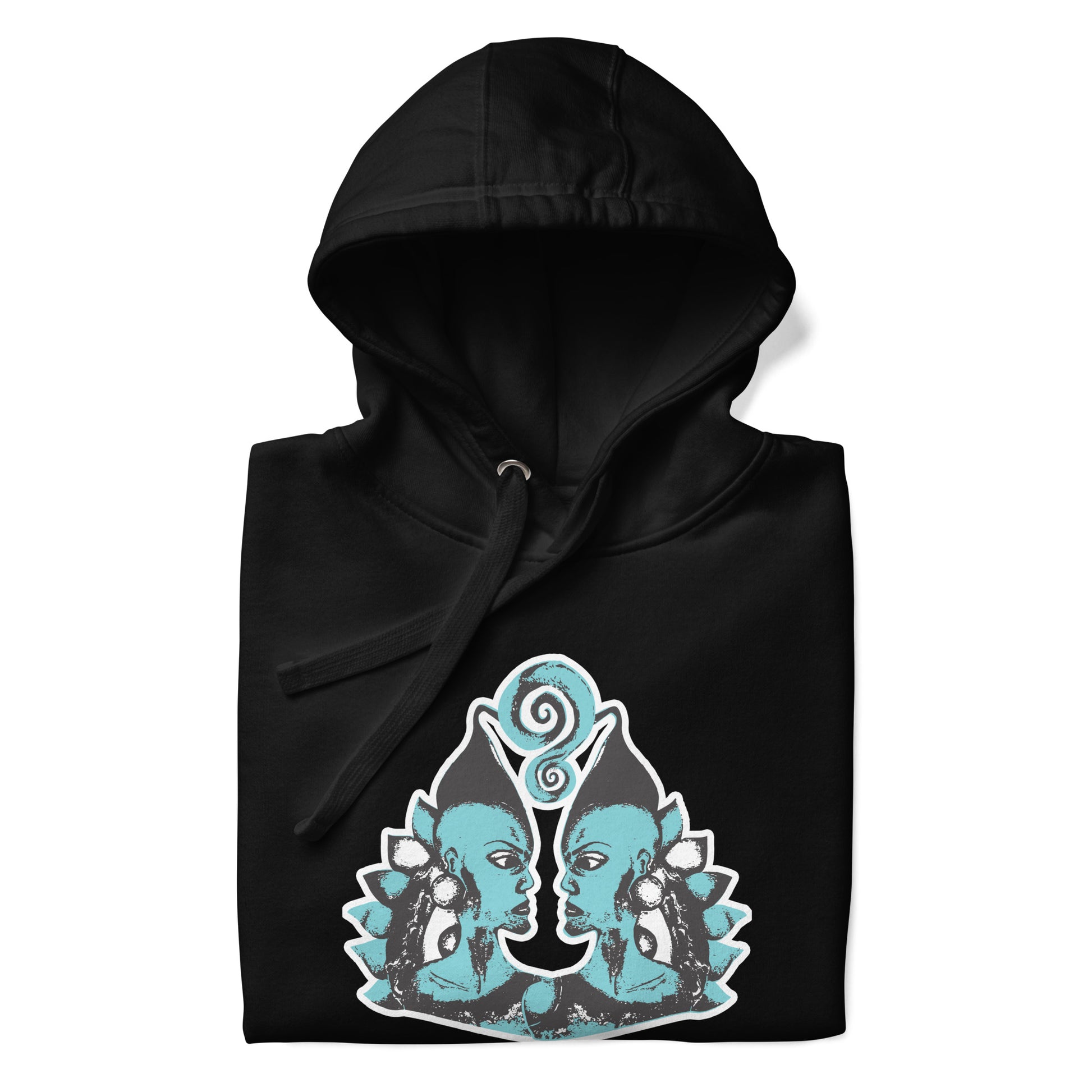 Folded black K.L.O.E. hoodie featuring a hand-drawn design of two mirrored faces in teal and white, highlighting culturally inspired, bohemian style fashion with a focus on individuality, artistic expression, and modern eco-friendly fashion.