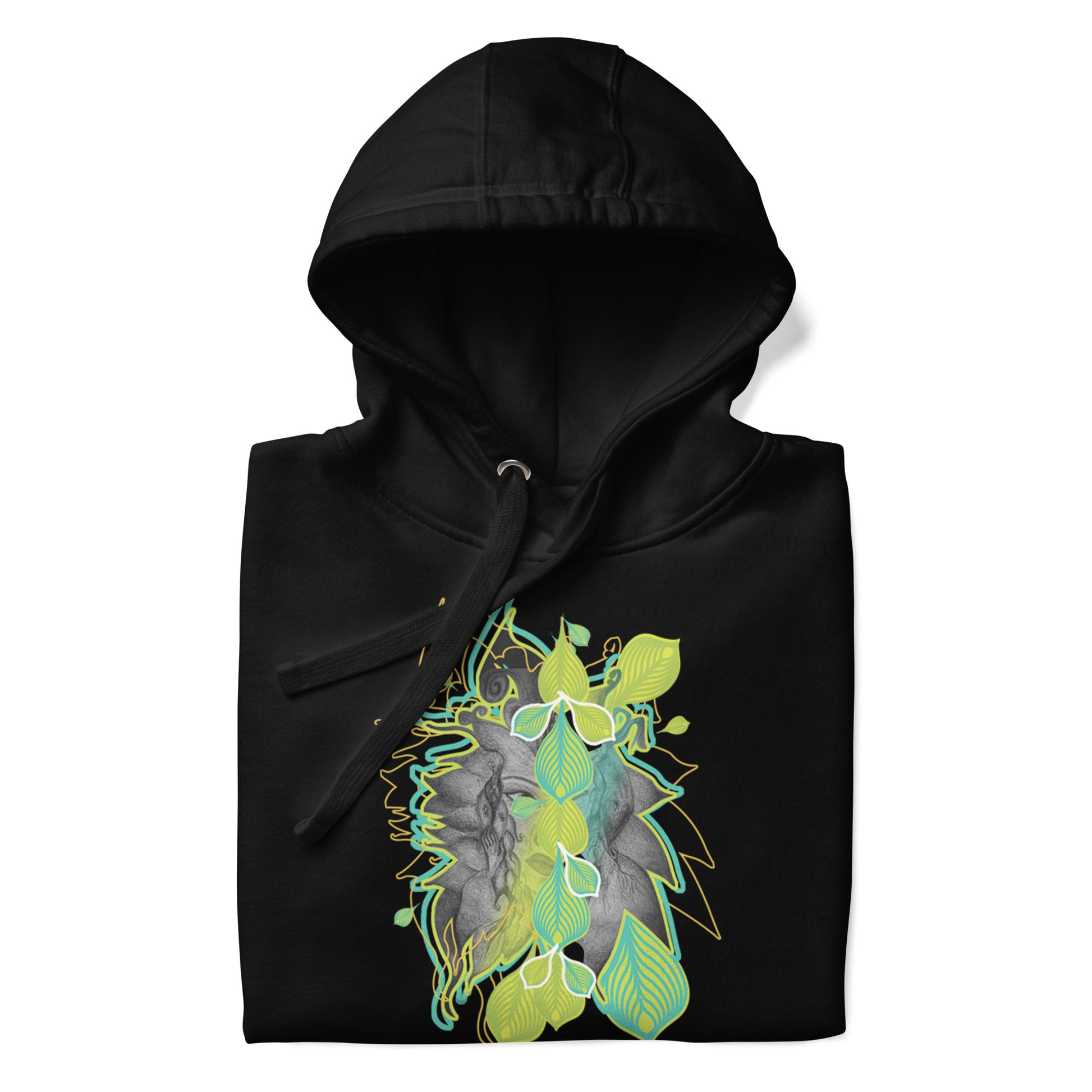 Detail view of a front side of black K.L.O.E. hoodie with vibrant green and yellow leaf patterns framing a detailed hand-drawn face design. A modern bohemian style statement that celebrates individuality, artistic expression, and culturally inspired fashion.