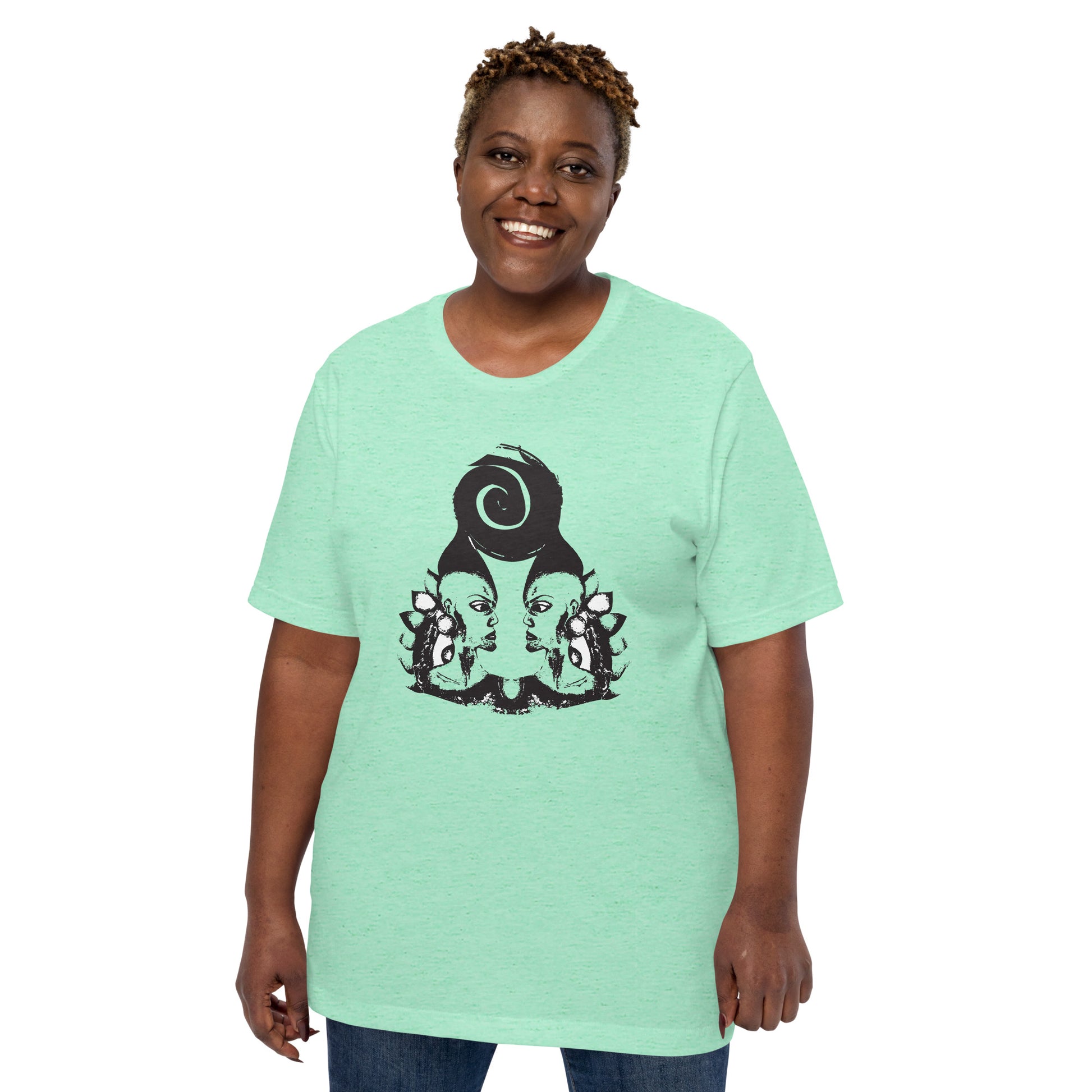 A model wearing mint t-shirt featuring wearable illustrations with an art-inspired black design of mirrored female faces and a bold central spiral symbol, celebrating expressive fashion and individuality – unique clothing by K.L.O.E.