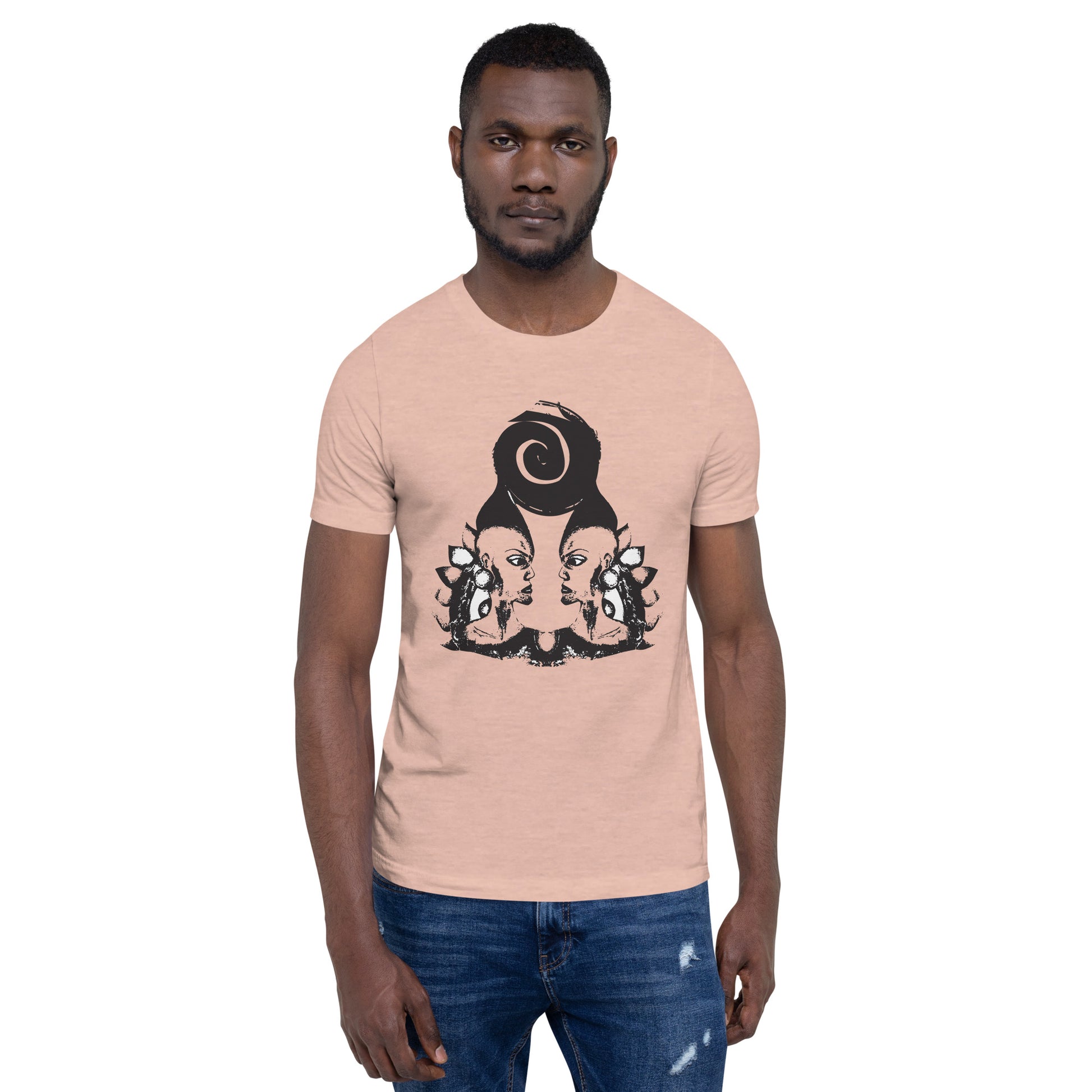 A male model wearing peach color t-shirt featuring wearable illustrations with an art-inspired black design of mirrored female faces and a bold central spiral symbol, celebrating expressive fashion and individuality – unique clothing by K.L.O.E.
