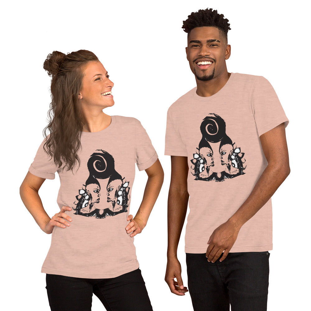 A couple wearing peach color t-shirt featuring a hand-drawn black ink design of two mirrored female figures with bold, intricate headpieces, connected by a swirling central element. This artistic piece from K.L.O.E. embraces cultural inspiration and self-expression, crafted for those who appreciate unique, expressive fashion and modern bohemian style.