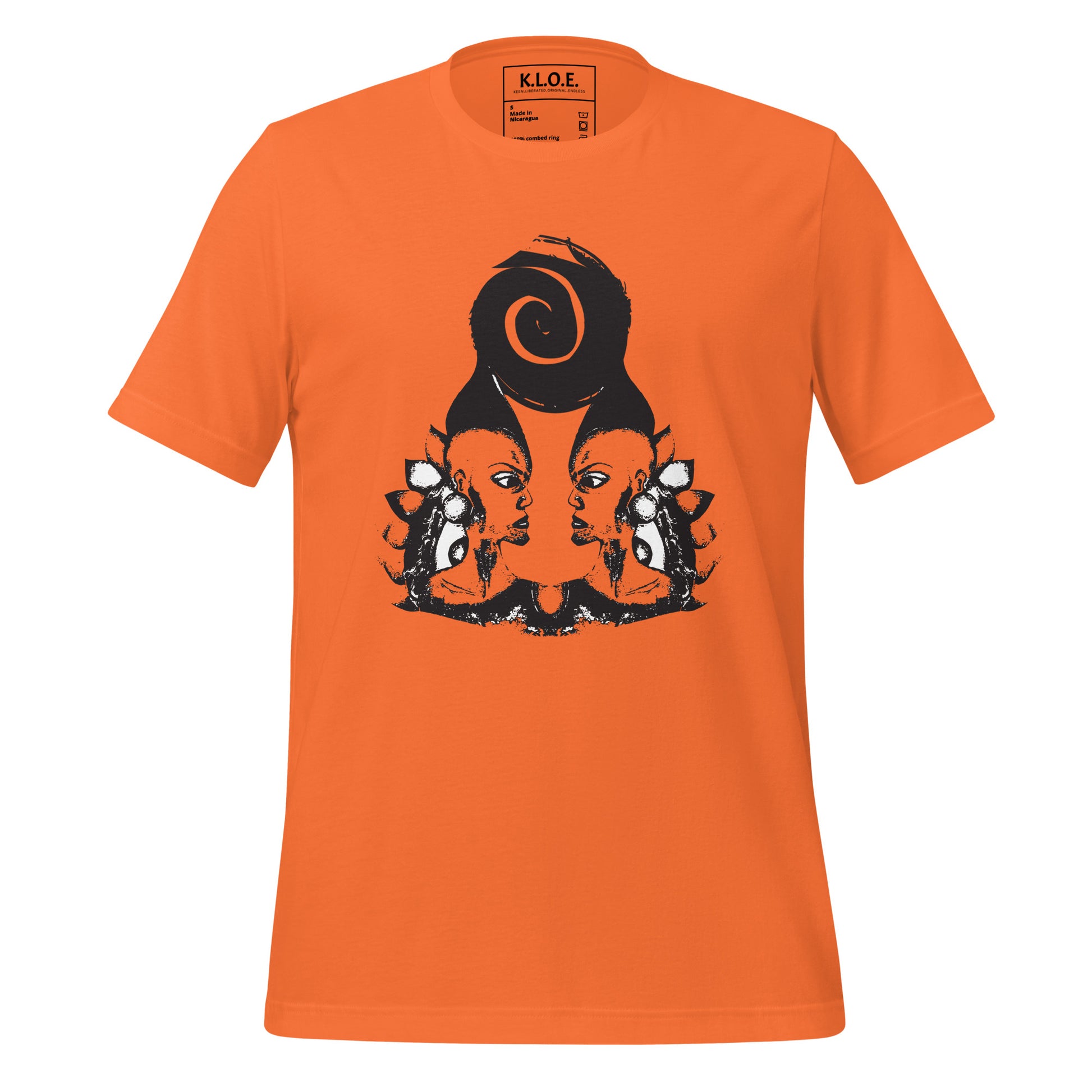 Orange t-shirt featuring a hand-drawn black ink design of two mirrored female figures with bold, intricate headpieces, connected by a swirling central element. This artistic piece from K.L.O.E. embraces cultural inspiration and self-expression, crafted for those who appreciate unique, expressive fashion and modern bohemian style.