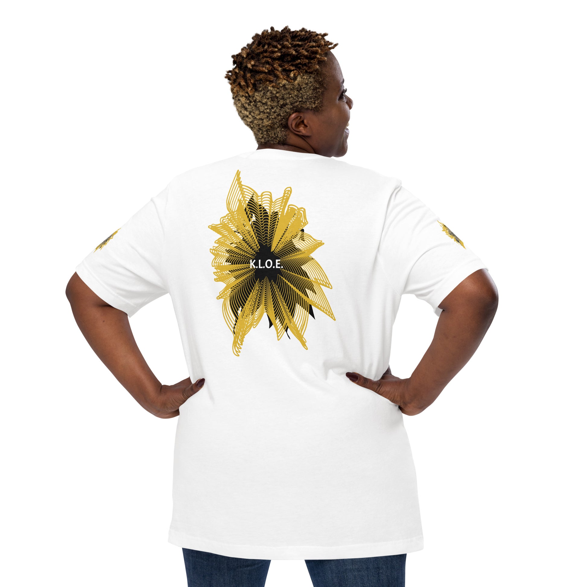 Back view of a white K.L.O.E. T-shirt showcasing a bold hand-drawn golden abstract sunburst design with black accents and the K.L.O.E. logo—an artistic and empowering piece of culturally inspired, handcrafted fashion that blends modern boho style with expressive  apparel, celebrating individuality and self-expression, on a model.