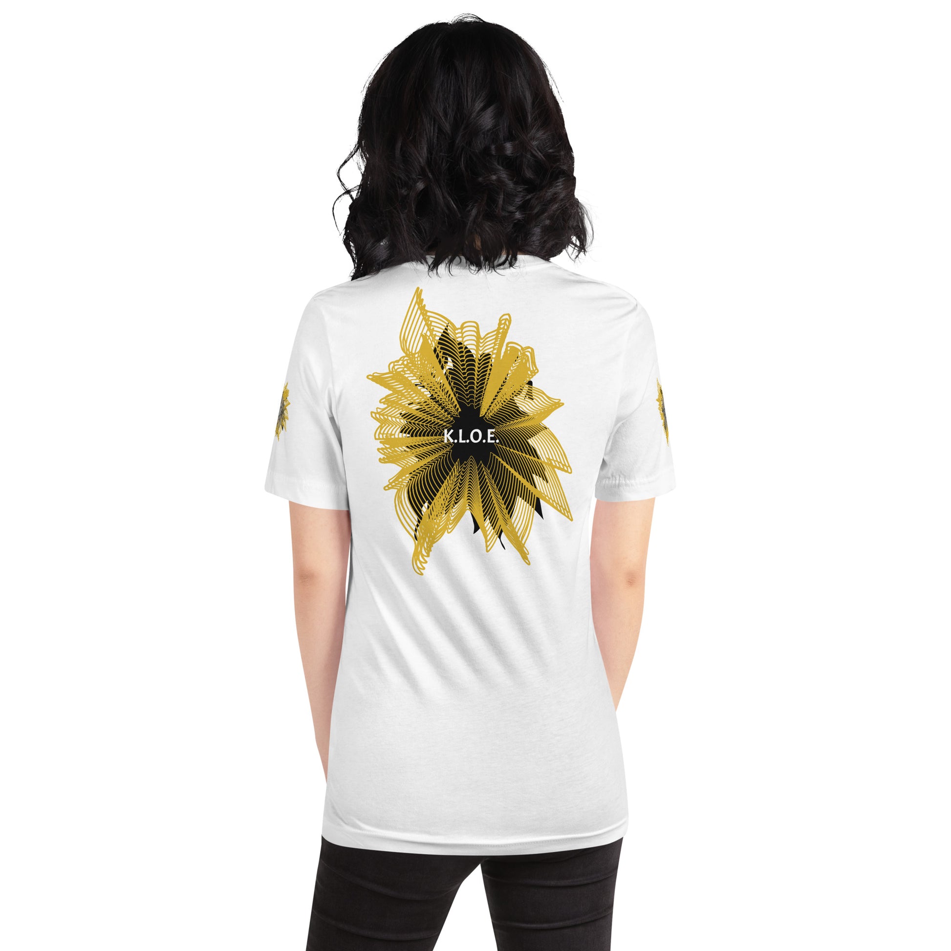 Back view of a white K.L.O.E. T-shirt showcasing a bold hand-drawn golden abstract sunburst design with black accents and the K.L.O.E. logo—an artistic and empowering piece of culturally inspired, handcrafted fashion that blends modern boho style with expressive apparel, celebrating individuality and self-expression, on a model.
