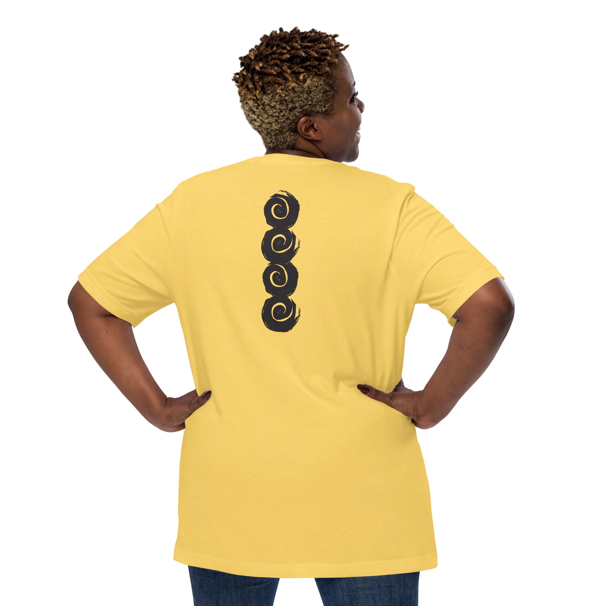 Back of a yellow t-shirt featuring a vertical row of four bold, black spiral symbols, hand-drawn in an expressive, brushstroke style. This culturally inspired design from K.L.O.E. highlights artisan craftsmanship and modern boho style, perfect for those who seek unique, eco-friendly fashion and artistic self-expression, worn by a plus size model.