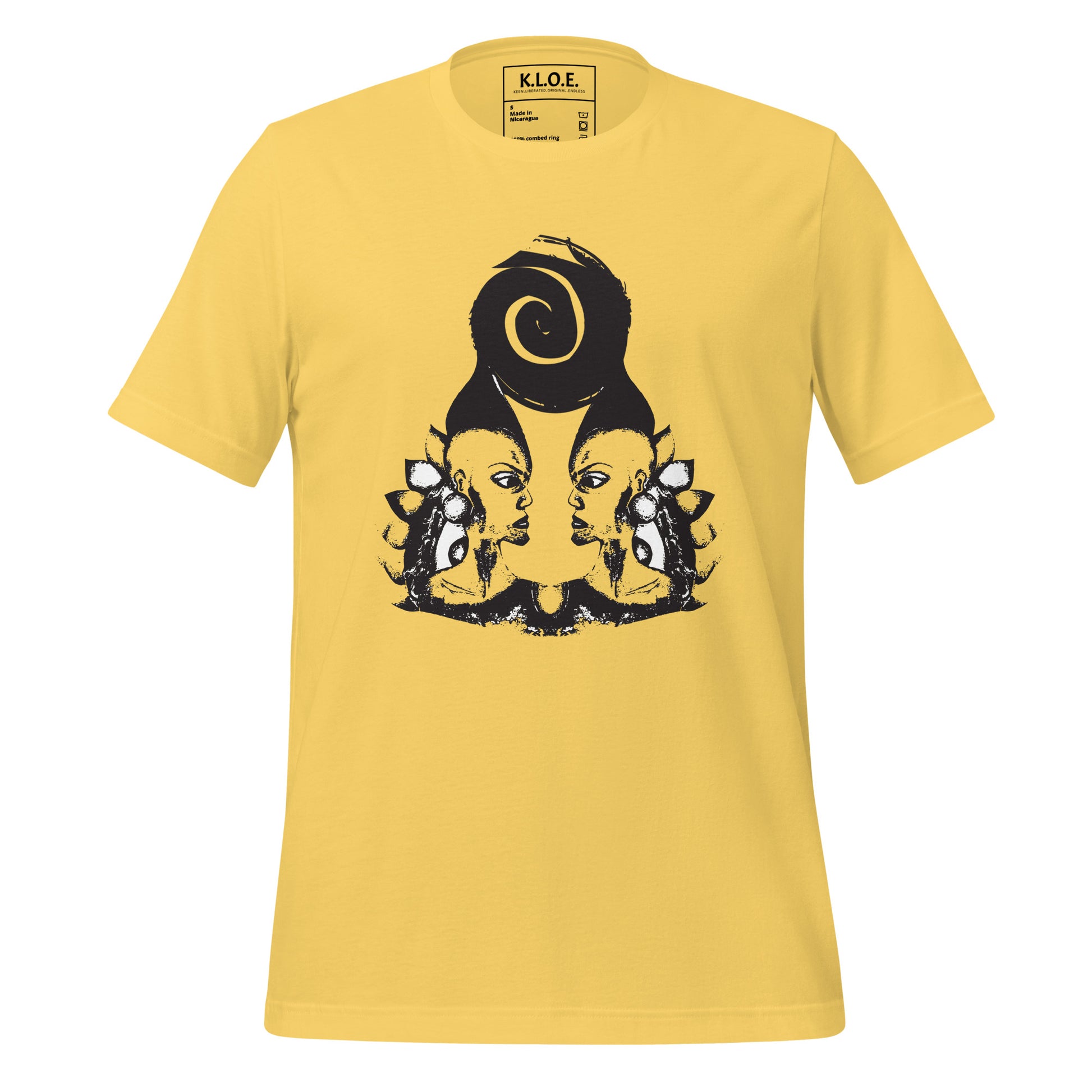 Yellow t-shirt featuring wearable illustrations with an art-inspired black design of mirrored female faces and a bold central spiral symbol, celebrating expressive fashion and individuality – unique clothing by K.L.O.E.
