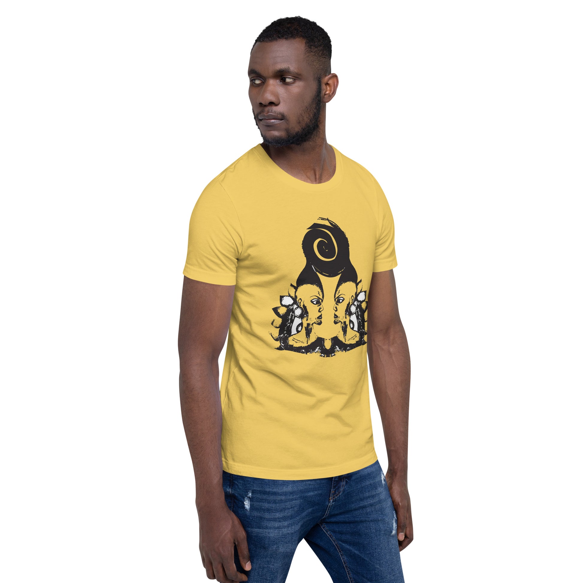 A  male model wearing yellow t-shirt featuring wearable illustrations with an art-inspired black design of mirrored female faces and a bold central spiral symbol, celebrating expressive fashion and individuality – unique clothing by K.L.O.E.