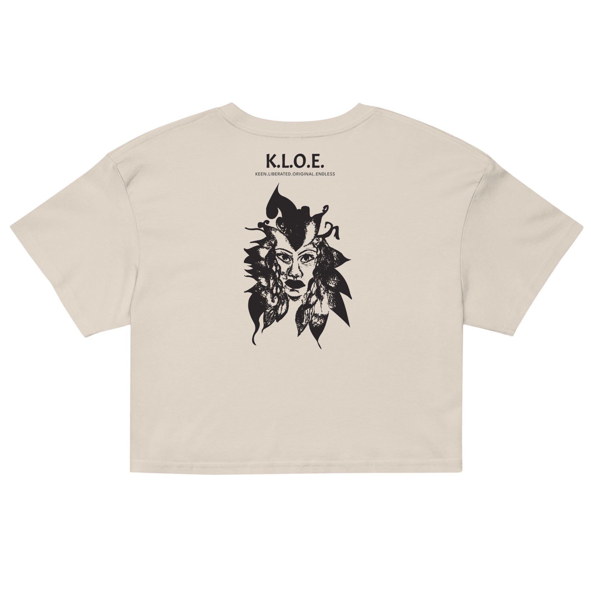 Back view of a bone K.L.O.E. crop t-shirt showcasing a culturally inspired, hand-drawn black design featuring a bold, expressive face intertwined with flowing, abstract patterns, and K.L.O.E. logo, embodying artistic self-expression and modern bohemian style fashion.