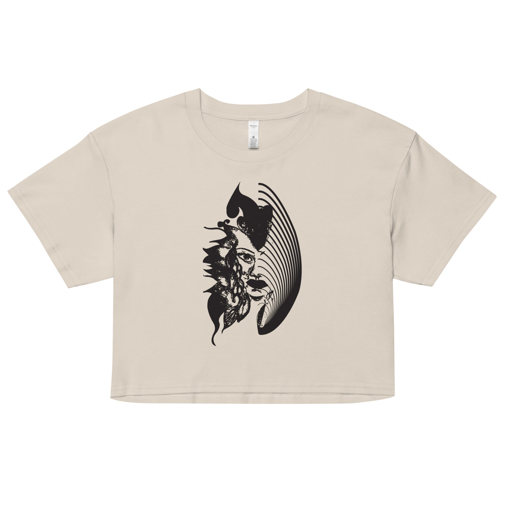 Bone K.L.O.E. crop t-shirt featuring a culturally inspired, hand-drawn black graphic of a bold, expressive face surrounded by intricate details, celebrating individuality and artistic self-expression in modern bohemian style fashion.