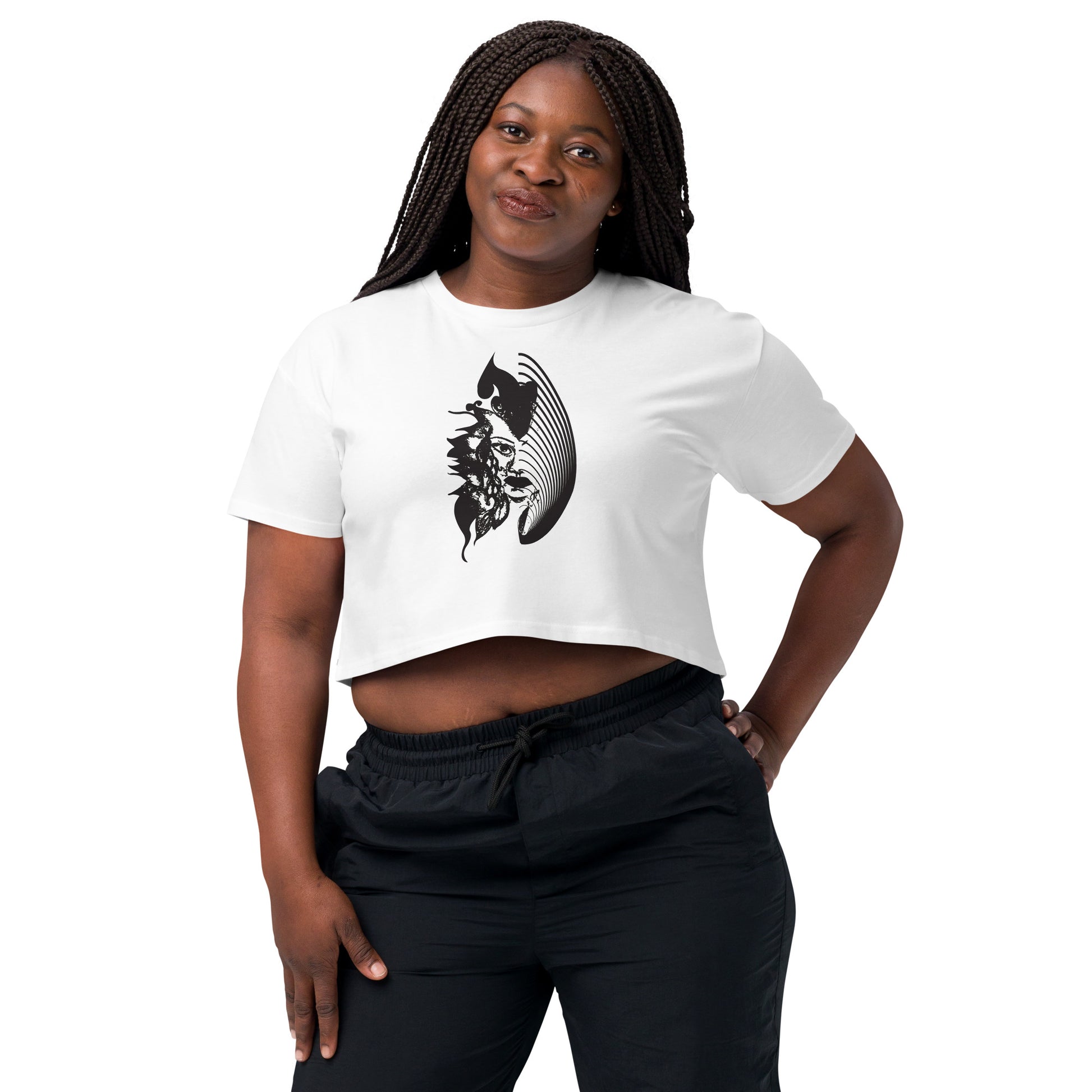A model wearing white K.L.O.E. crop t-shirt featuring a culturally inspired, hand-drawn black graphic of a bold, expressive face surrounded by intricate details, celebrating individuality and artistic self-expression in modern bohemian style fashion.