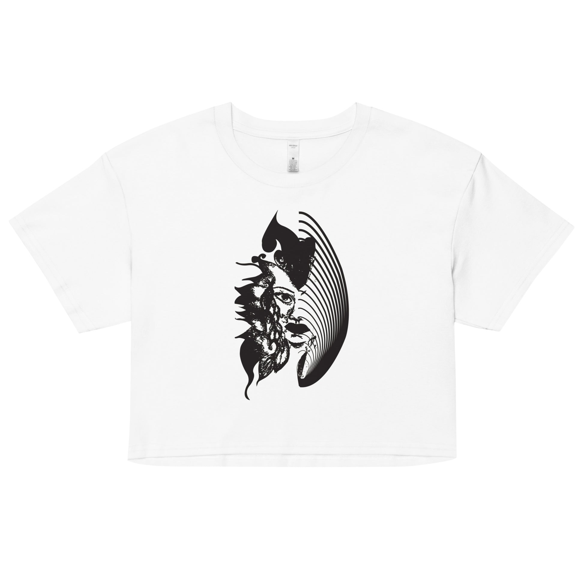 White K.L.O.E. crop t-shirt featuring a culturally inspired, hand-drawn black graphic of a bold, expressive face surrounded by intricate details, celebrating individuality and artistic self-expression in modern bohemian style fashion.
