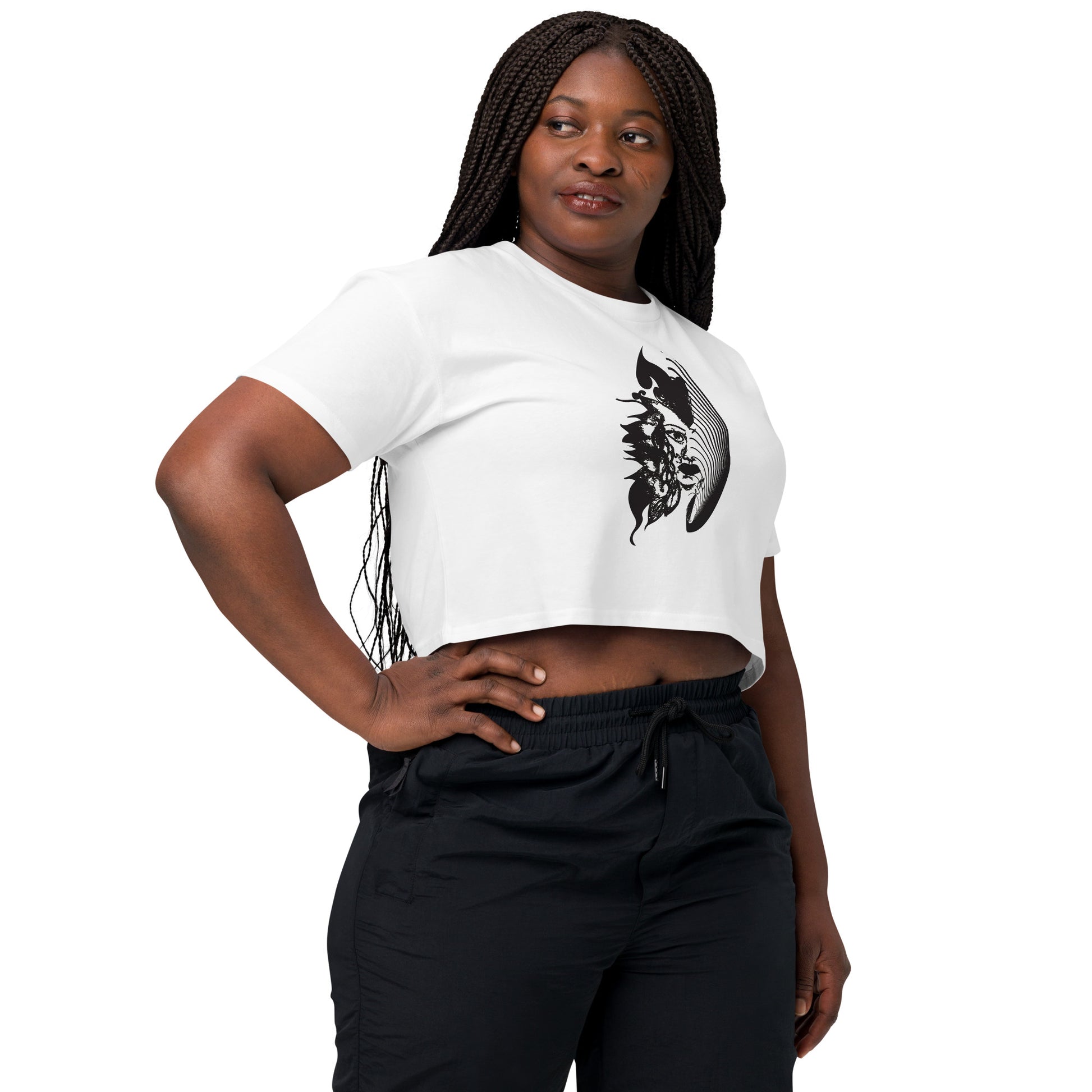A model wearing white K.L.O.E. crop t-shirt featuring a culturally inspired, hand-drawn black graphic of a bold, expressive face surrounded by intricate details, celebrating individuality and artistic self-expression in modern bohemian style fashion.