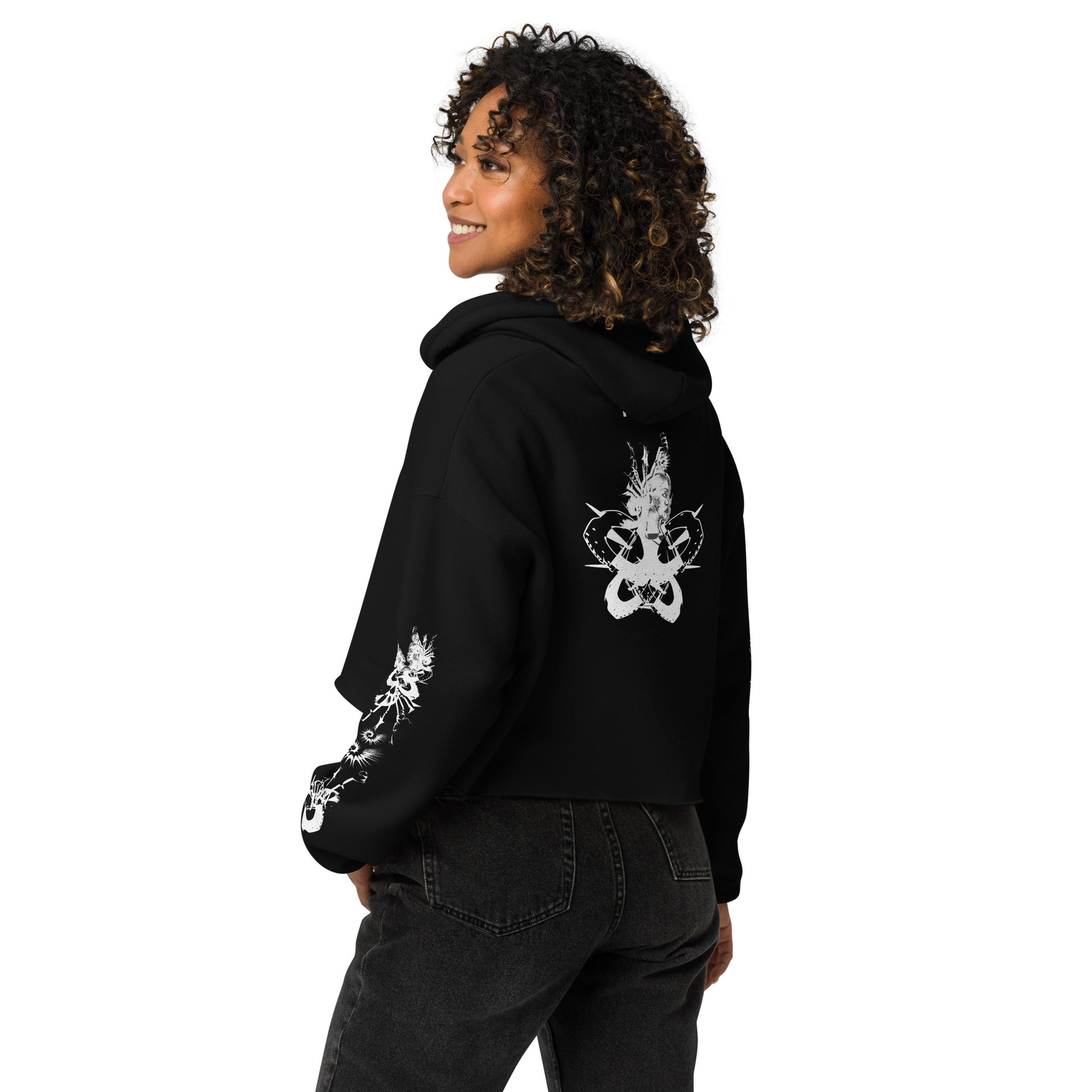 Back view of black unisex K.L.O.E. crop hoodie with white abstract hand-drawn illustration of two faces intertwined with organic shapes and cultural symbolism—expressing metamorphosis, identity, and artistic freedom.