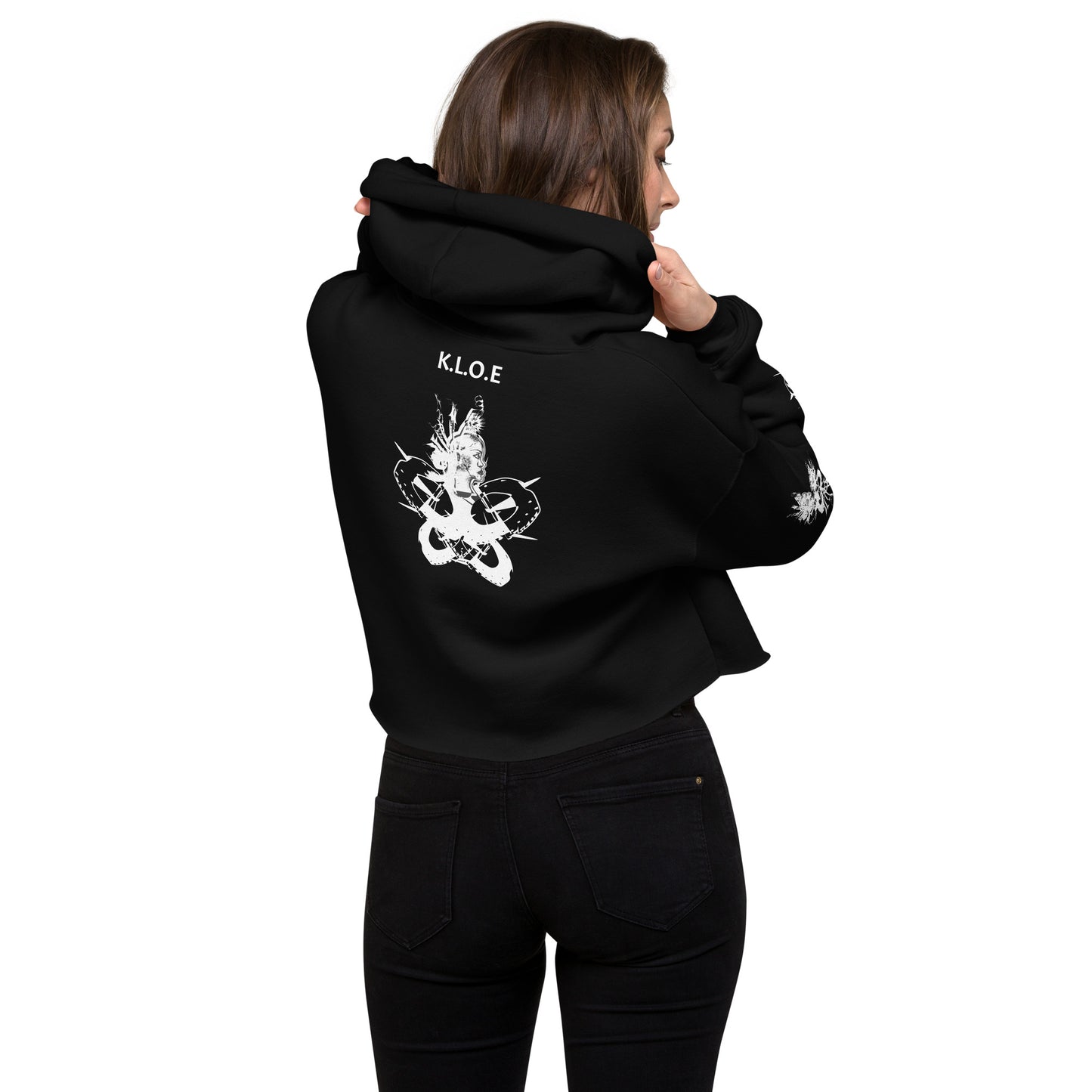Back view of black unisex K.L.O.E. crop hoodie with white abstract hand-drawn illustration of two faces intertwined with organic shapes and cultural symbolism—expressing metamorphosis, identity, and artistic freedom.